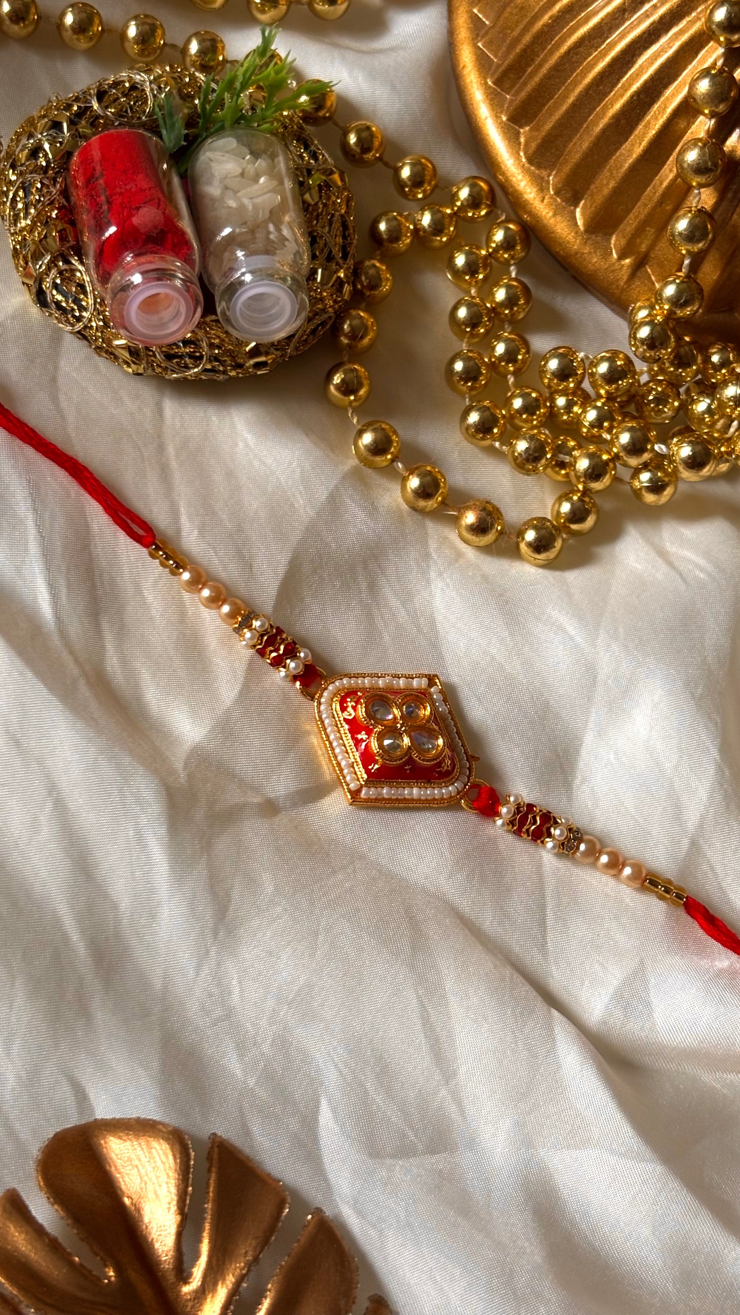 Red meenakari Kundan rakhi ( shipping will be extra )