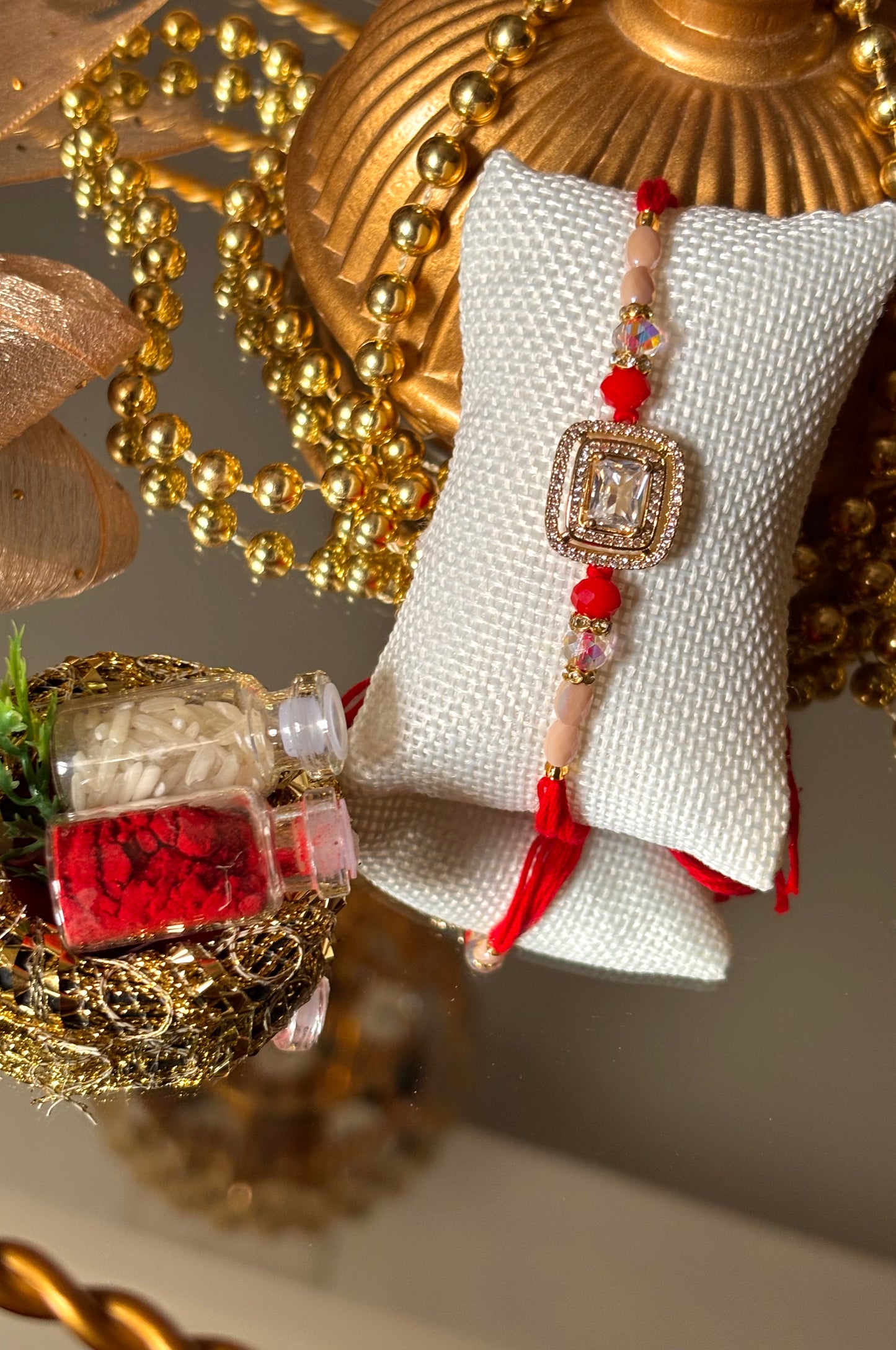 Diamond polki red rakhi ( shipping will be extra )