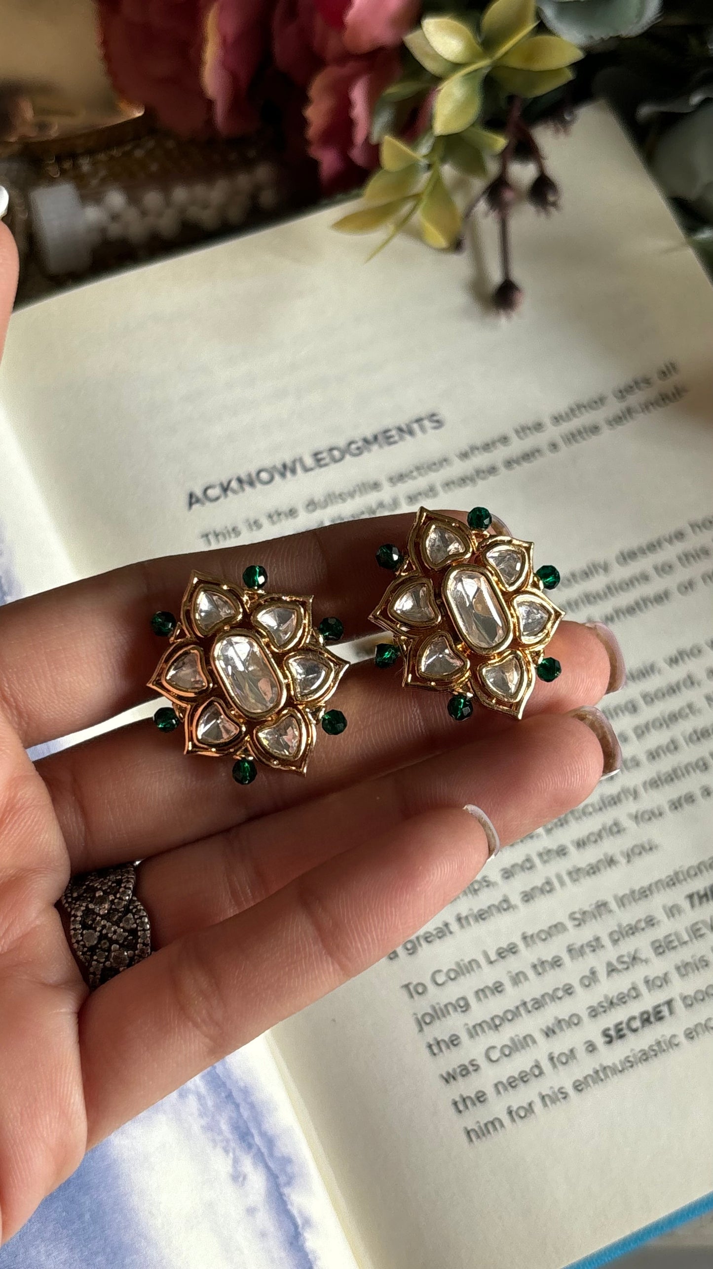 Polki studs with hint of emerald