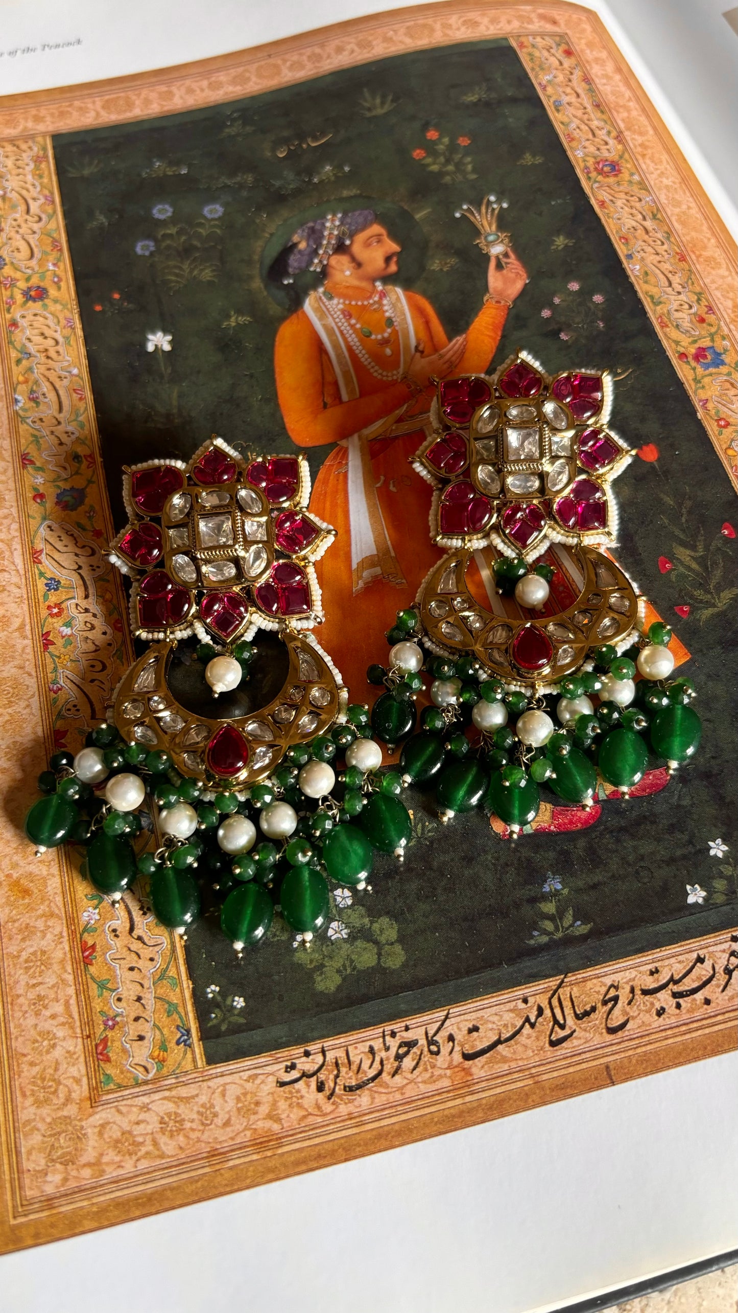 Svara Ruby kat dana with emerald white string choker with earrings
