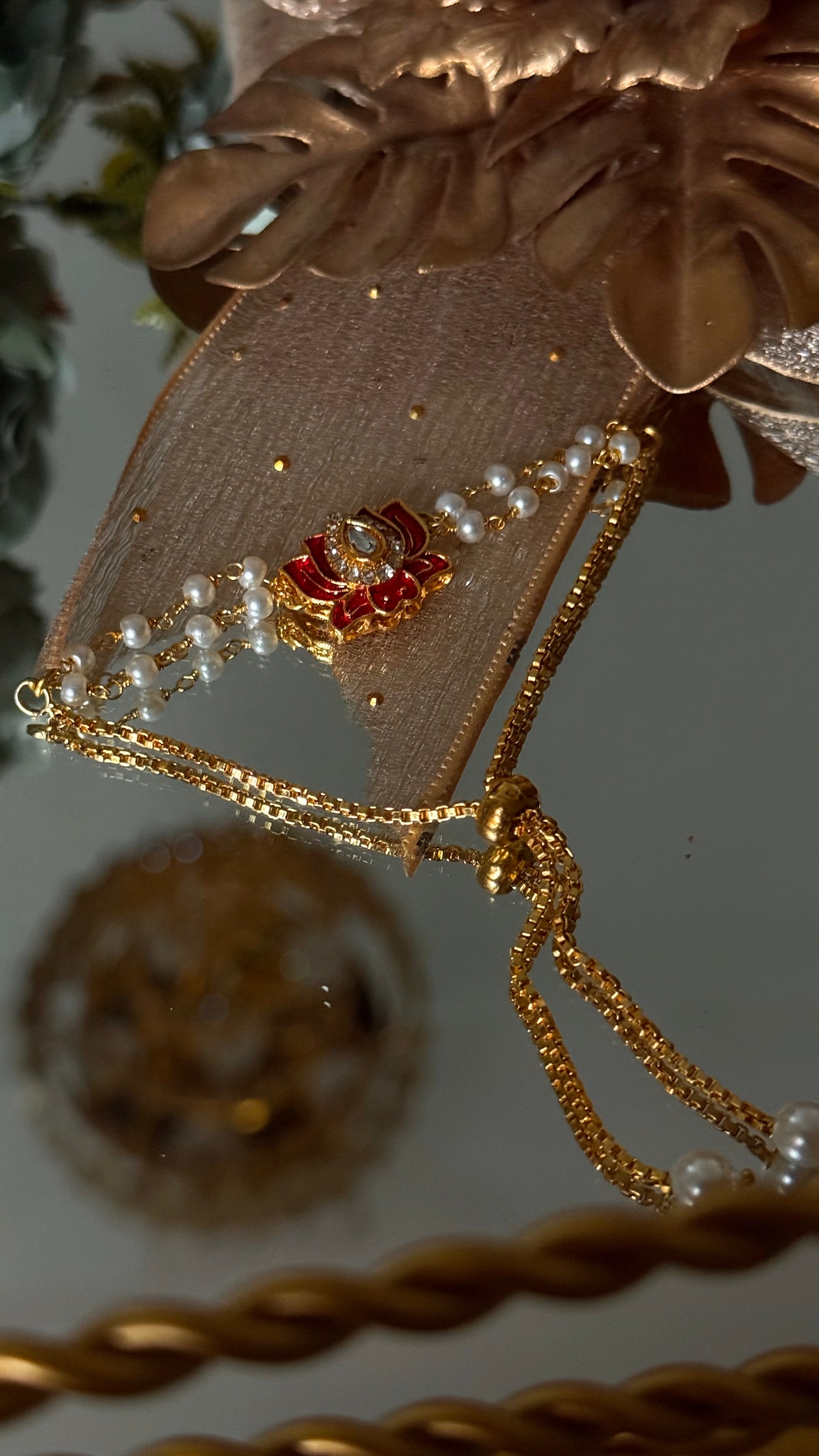 Ruby lotus inspired rakhi