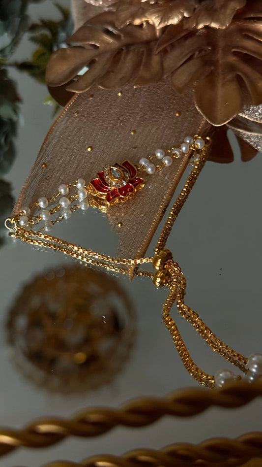 Ruby lotus inspired rakhi ( shipping will be extra )