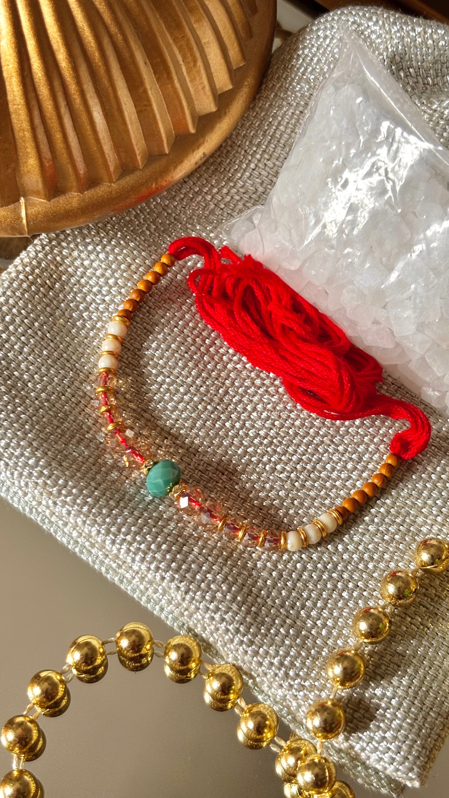 Firoza thread rakhi (shipping will be extra )