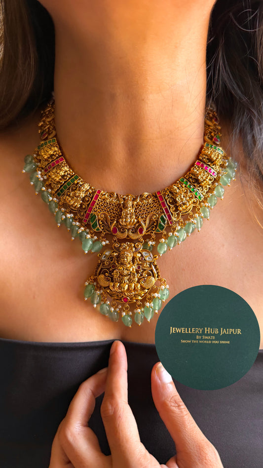 Goddess laxmi on lotus with mint drop temple collar set