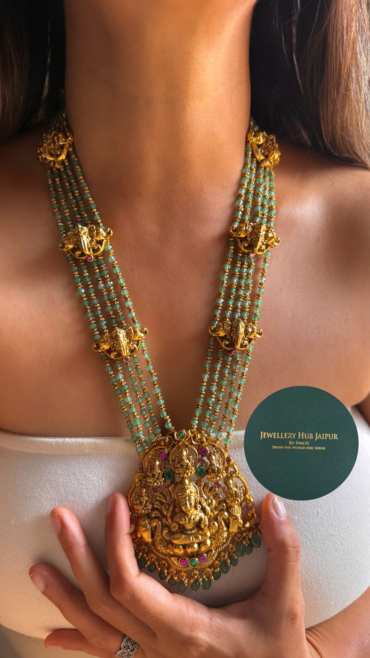 Goddess laxmi emerald & rani pink with mint string & gajj long set