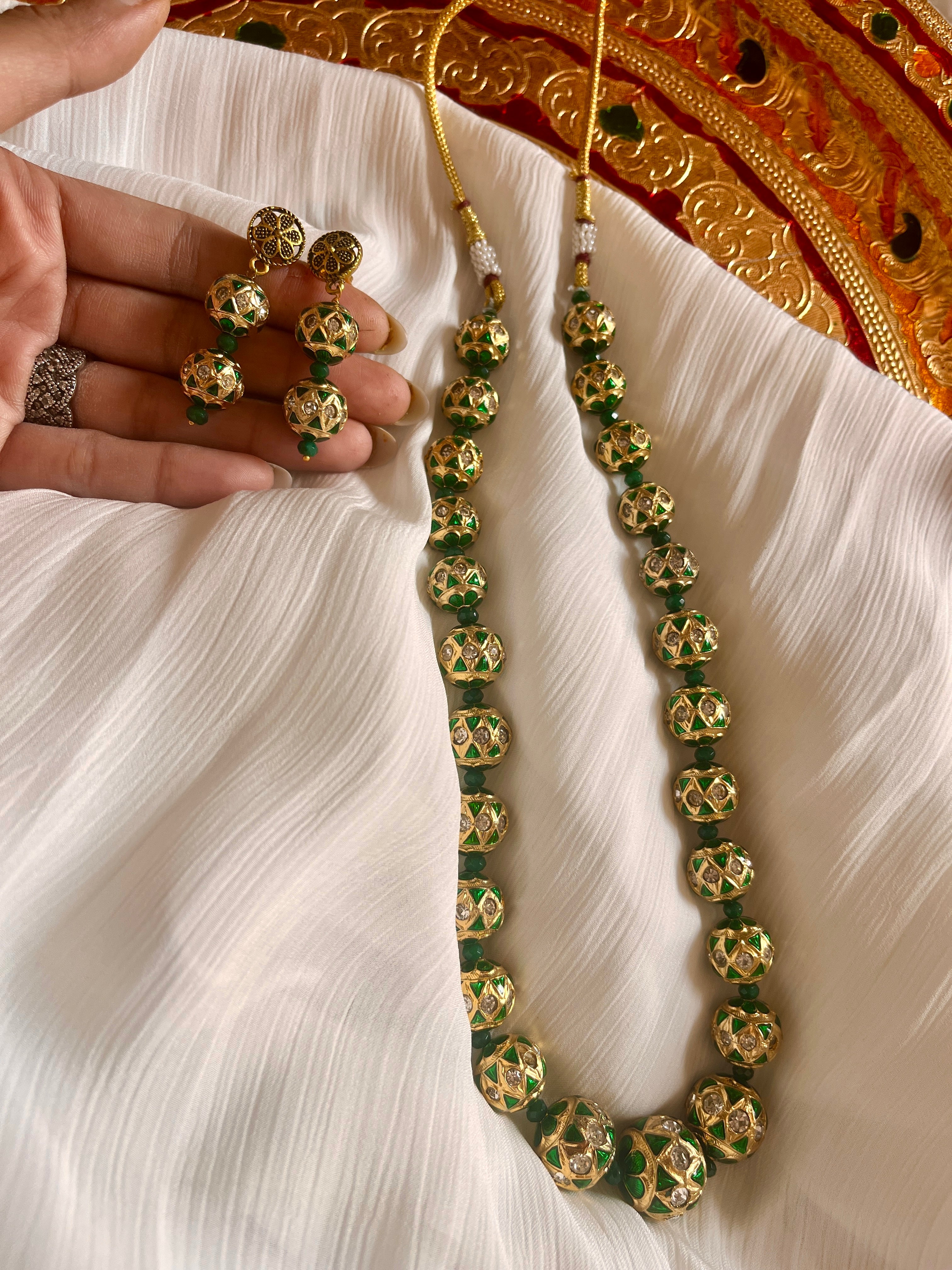 Emerald meenakari string