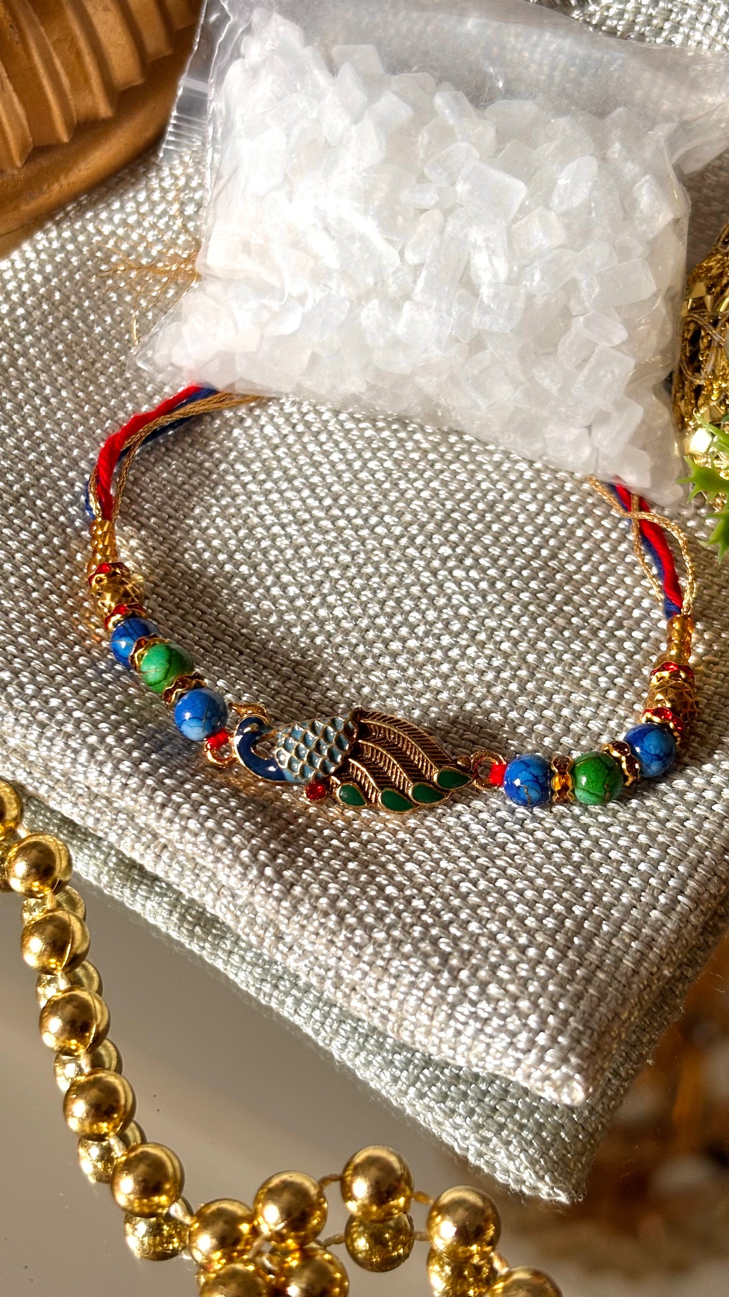 Peacock designer minimalist rakhi ( shipping will be extra )