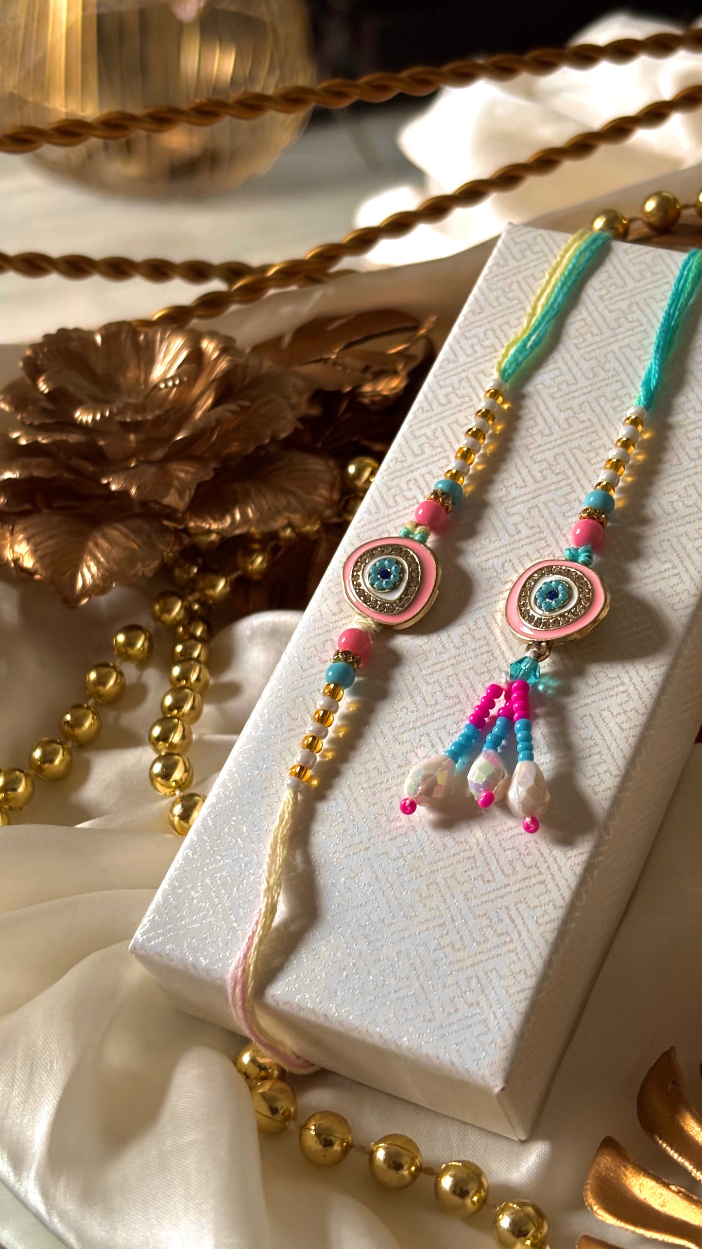 Evil eye pastel colour bhaiya bhabi lumba rakhi ( shipping will be extra )