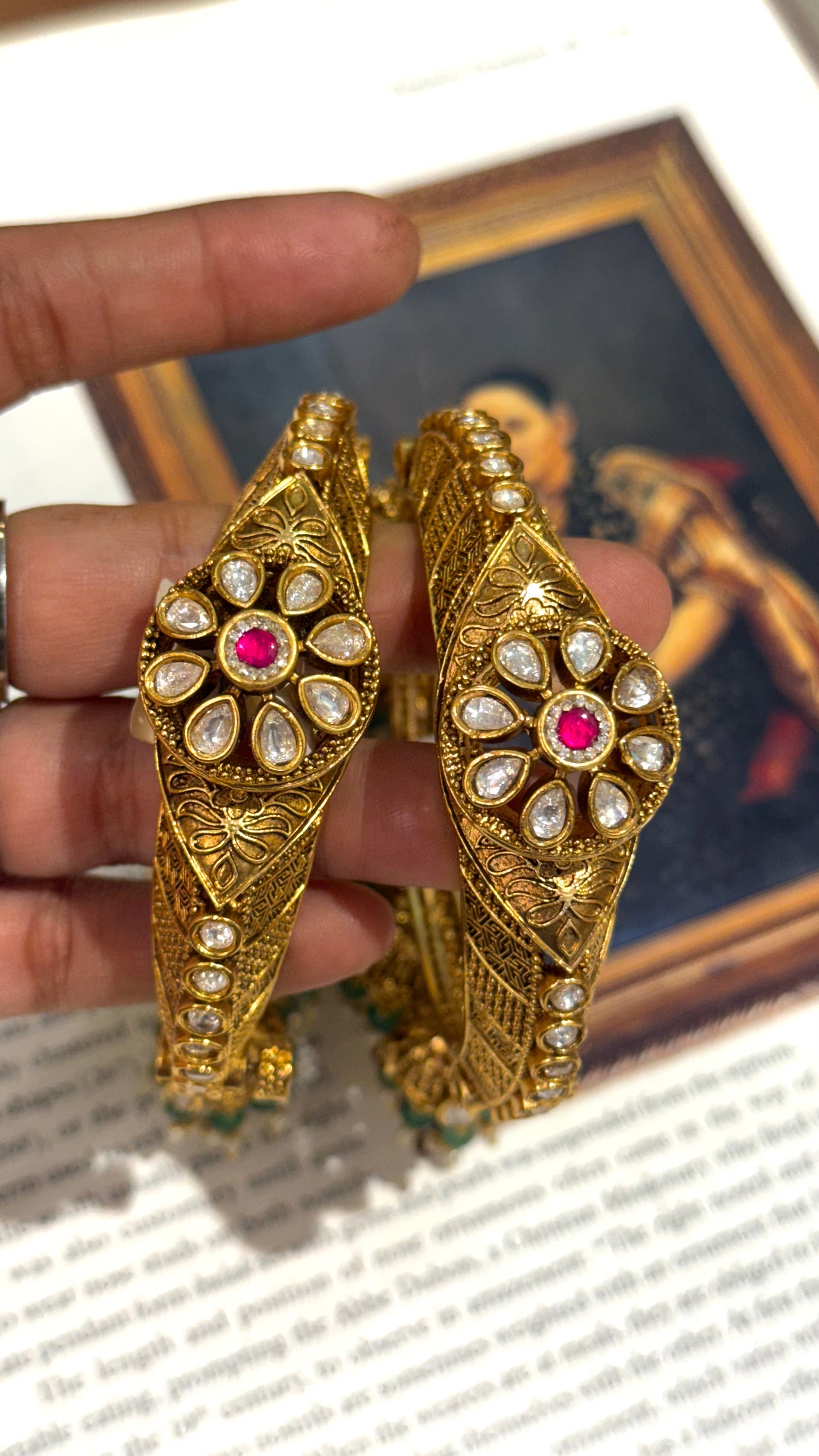 Rajwasa floral pattern bangles with rani pink stone and jhumki details