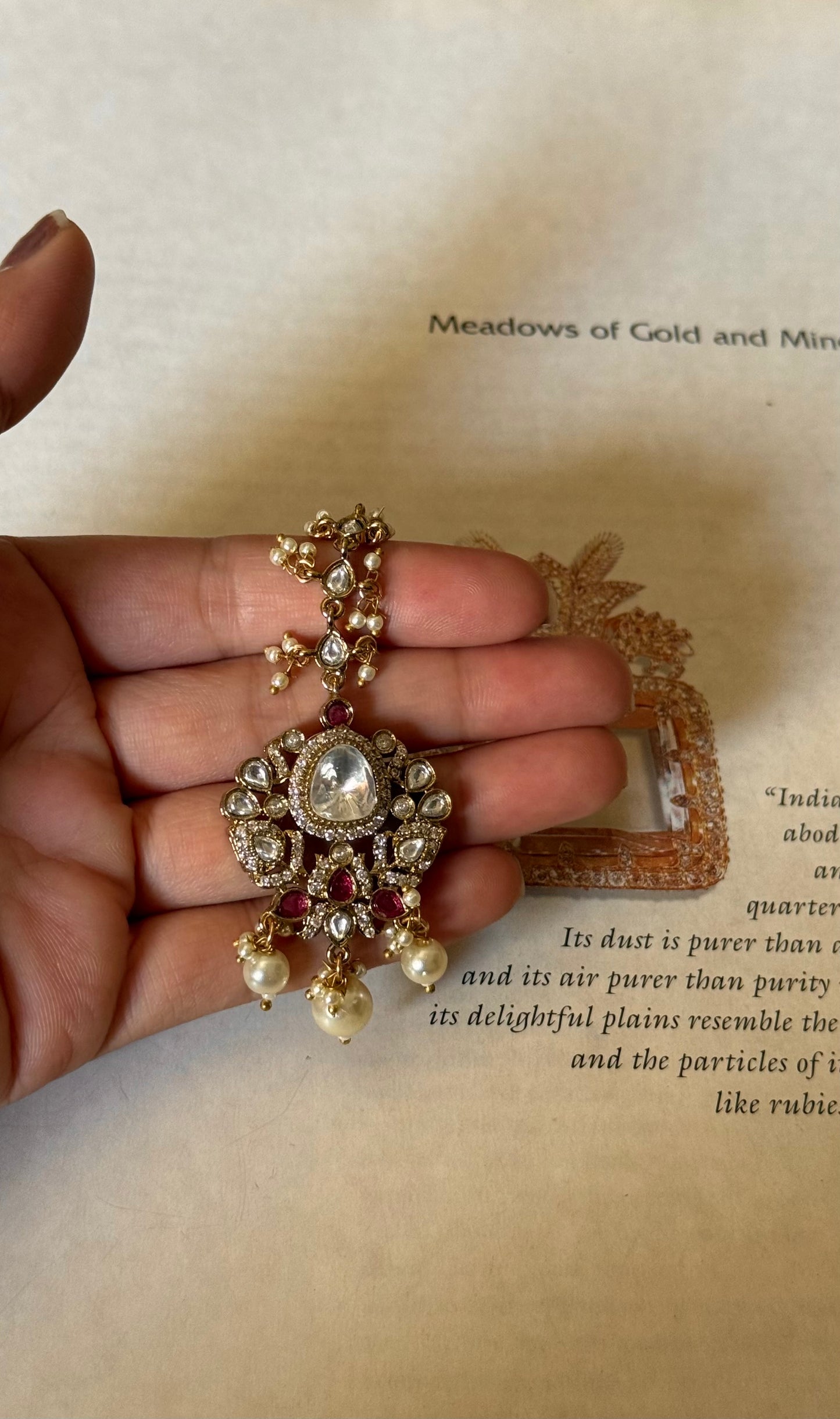 Tear shaped polki with pearl drop detailing maangtikka