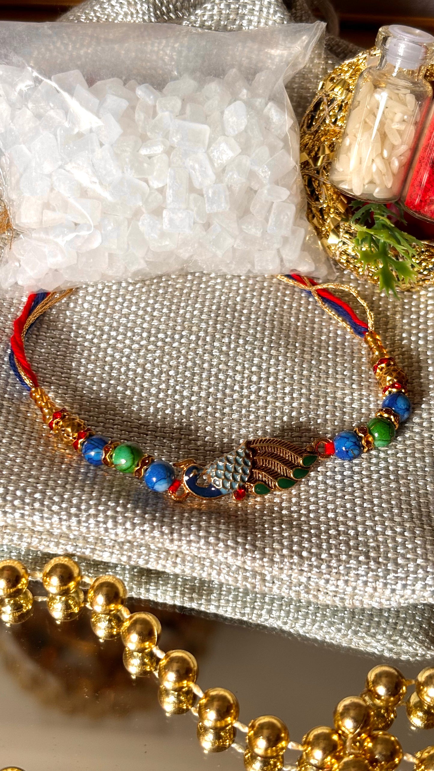 Peacock designer minimalist rakhi ( shipping will be extra )