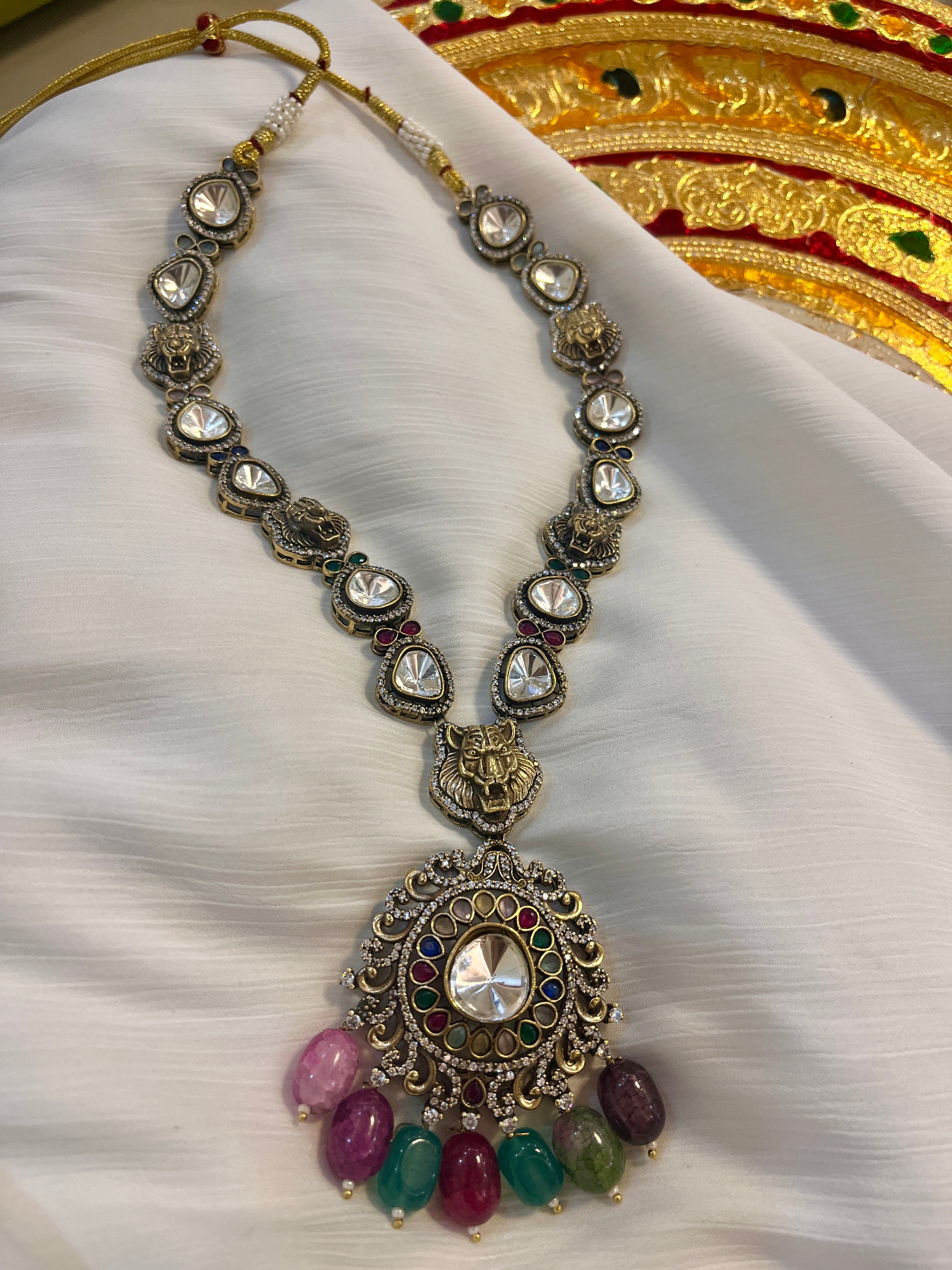 Sabhyasachi Navratna leopard uncut polki necklace