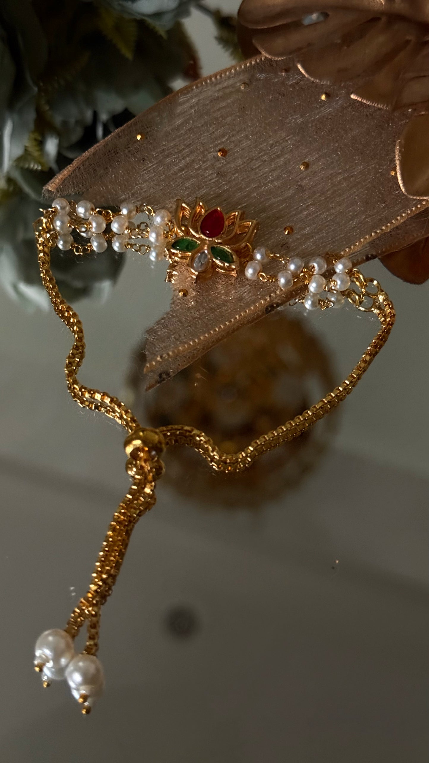 Ruby & emerald lotus inspired Rakhi (shipping will be extra )