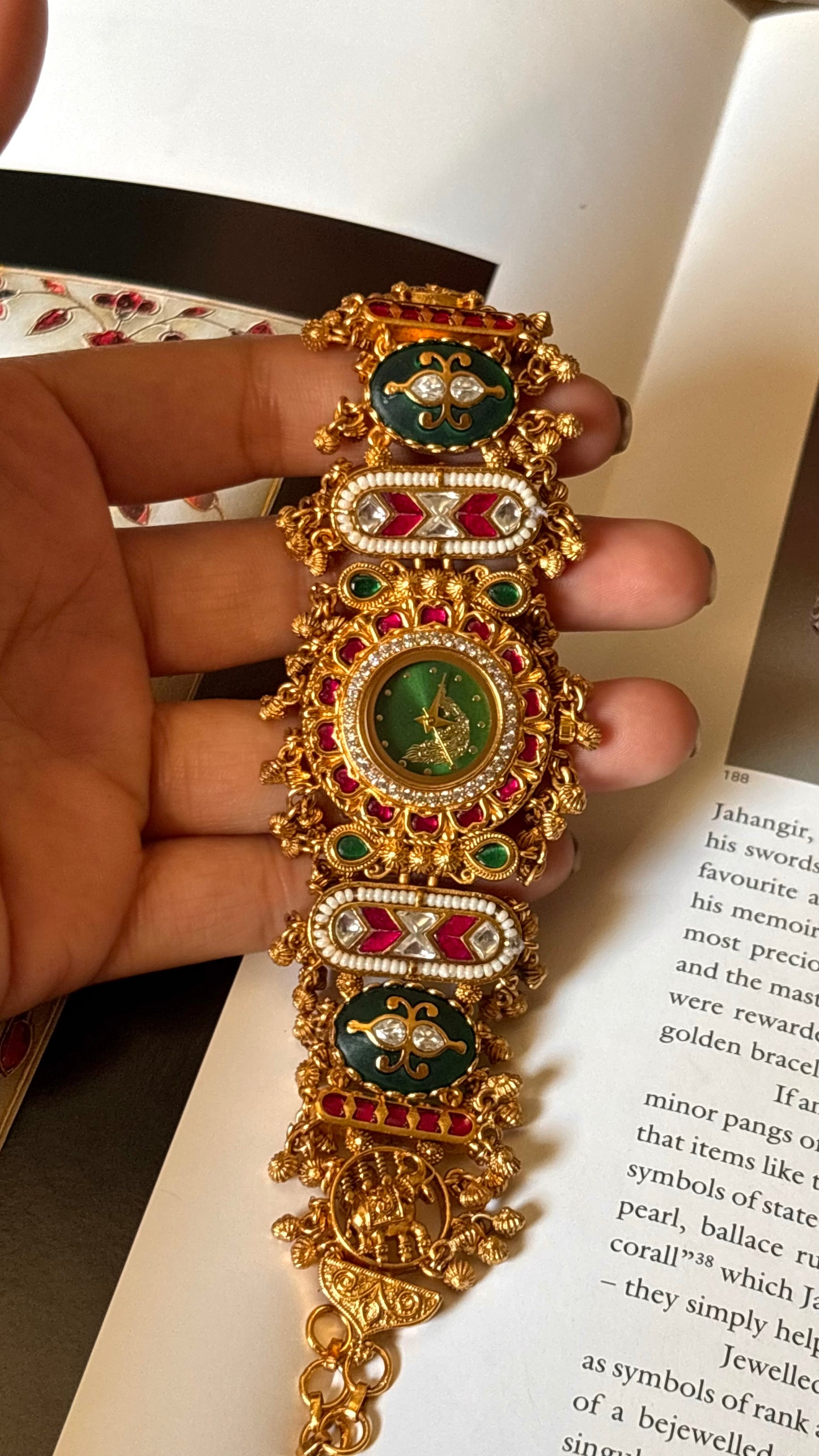 Emerald inlay round emerald dial watch