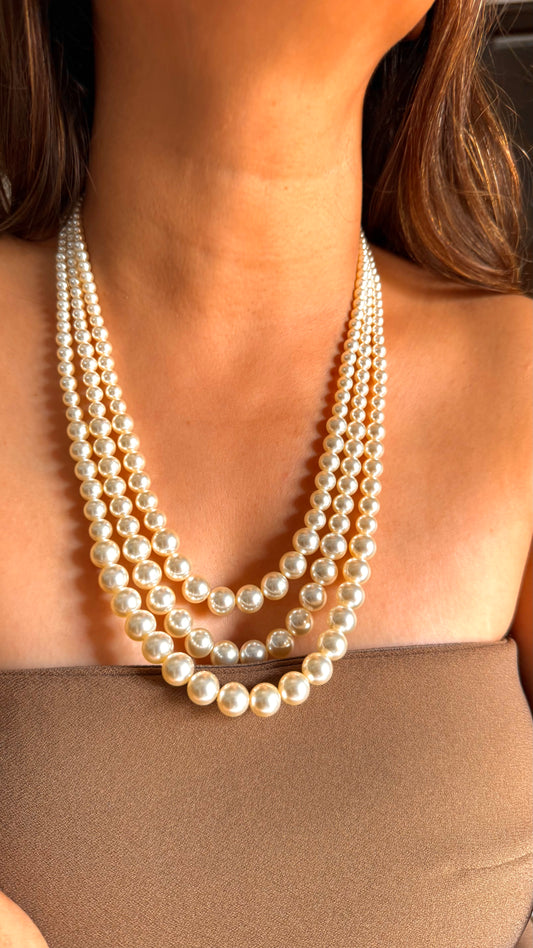 Triple layer pearl mid length necklace