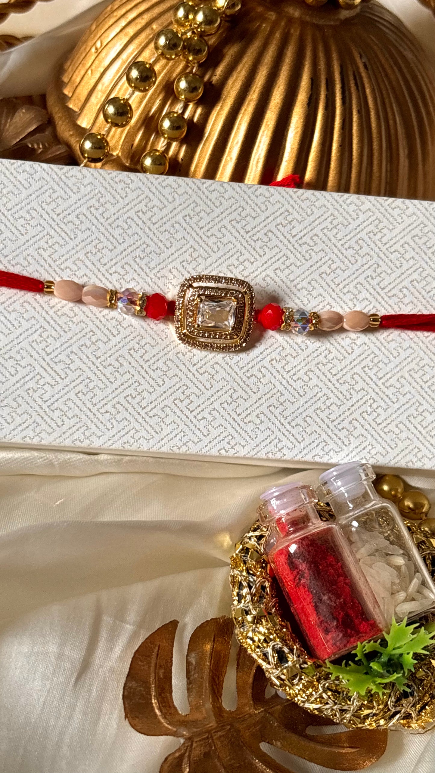 Diamond polki red rakhi ( shipping will be extra )
