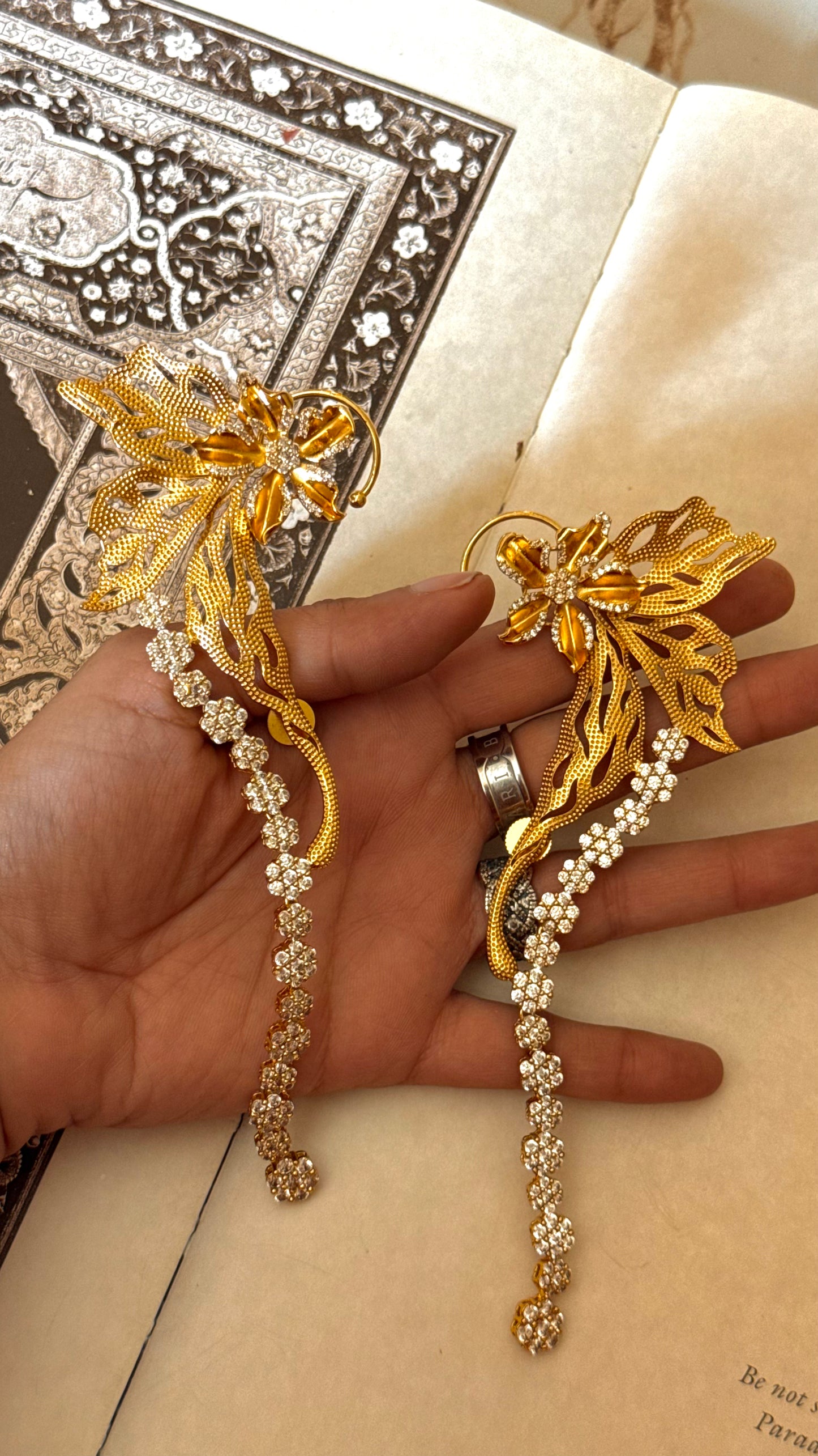 Designer Carnival ear cuff with floral diamond earrings