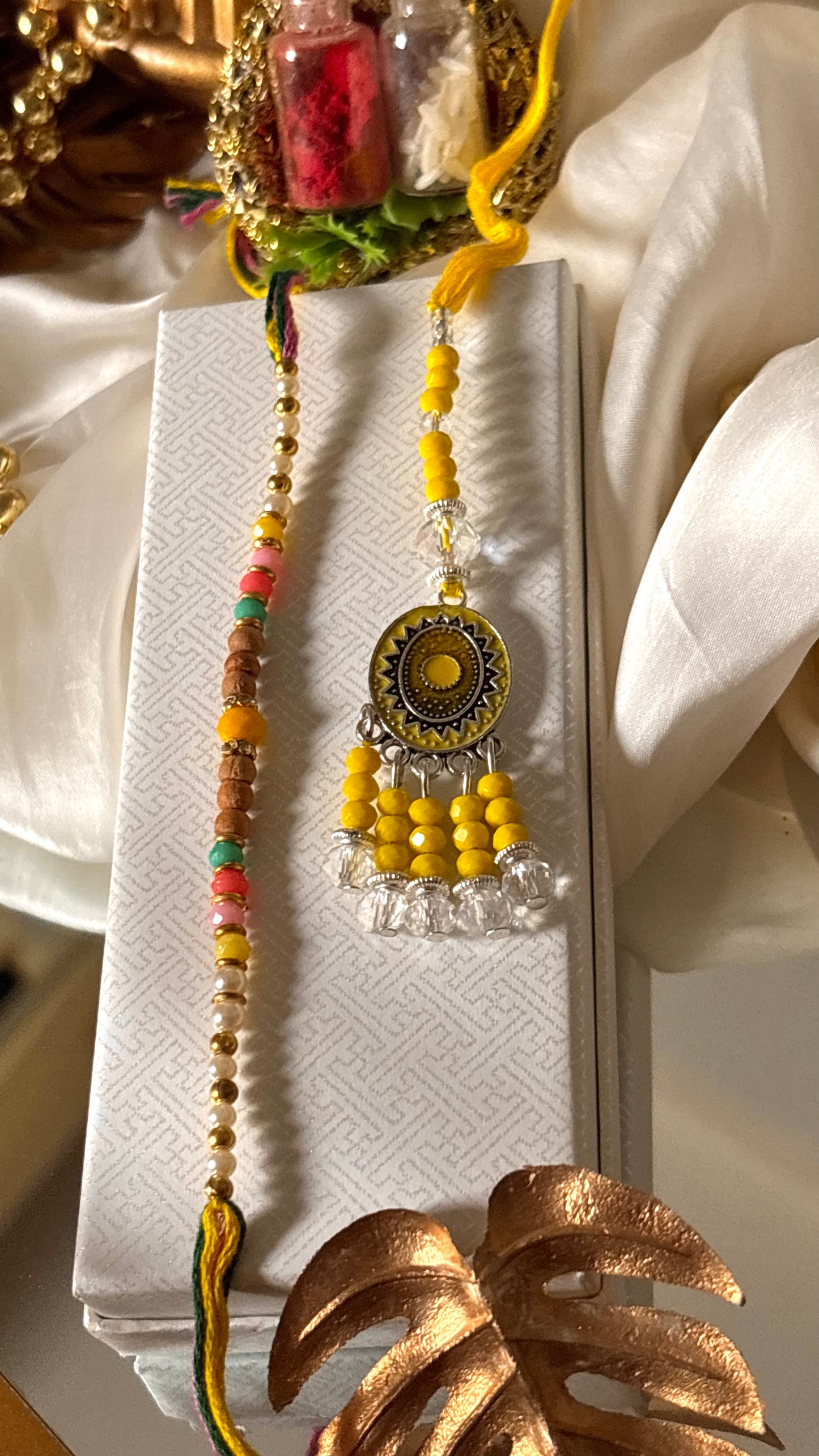 Bhaiya bhabhi lumba topaz nakashi oxidised rakhi ( shipping will be extra )
