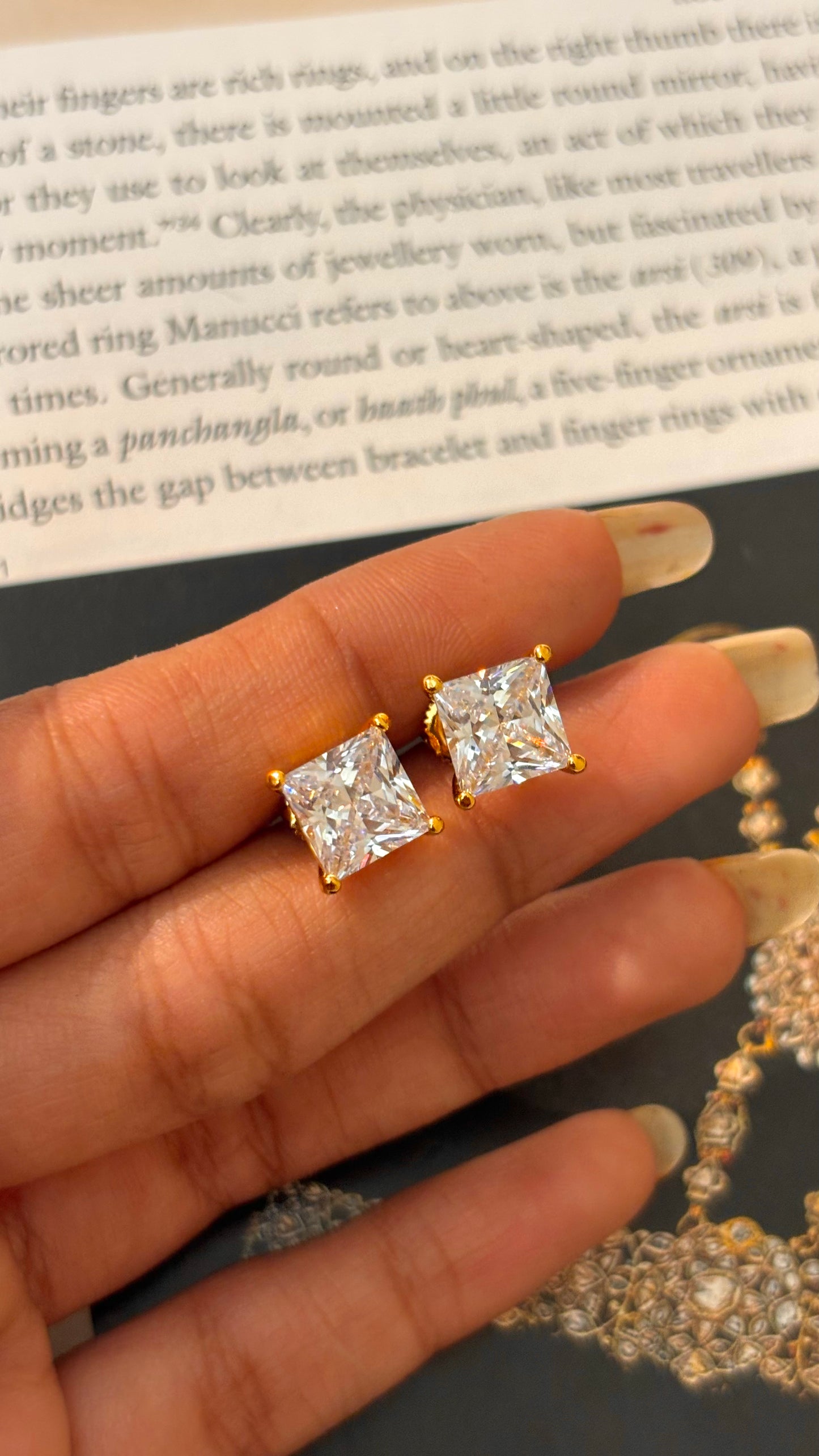 Emerald cut 2 carat gold studs