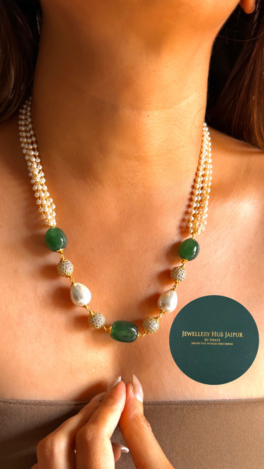 Emerald & off white pearl string