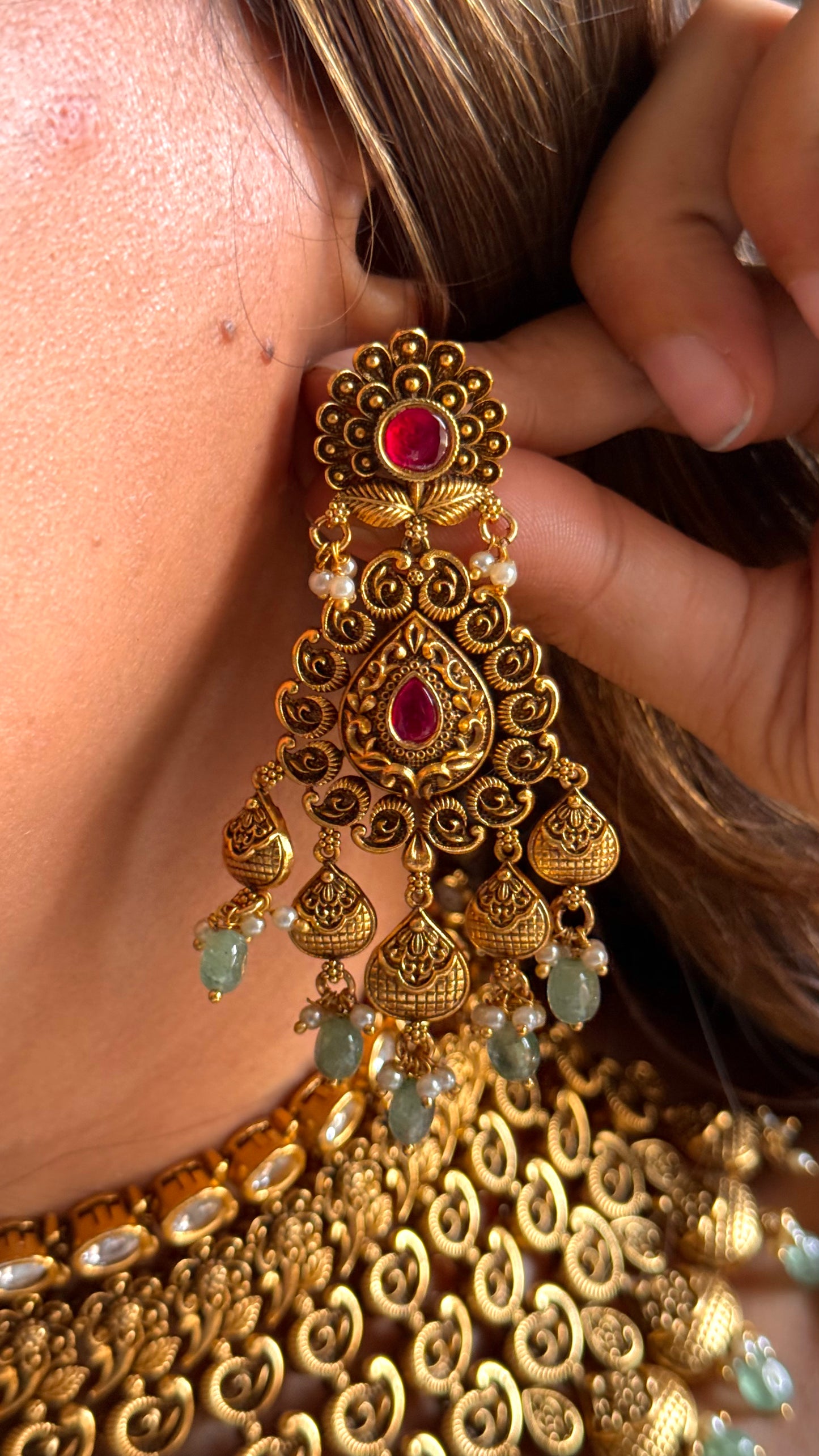 Ambi nakshi oxidised gold choker with ruby and mint detailing