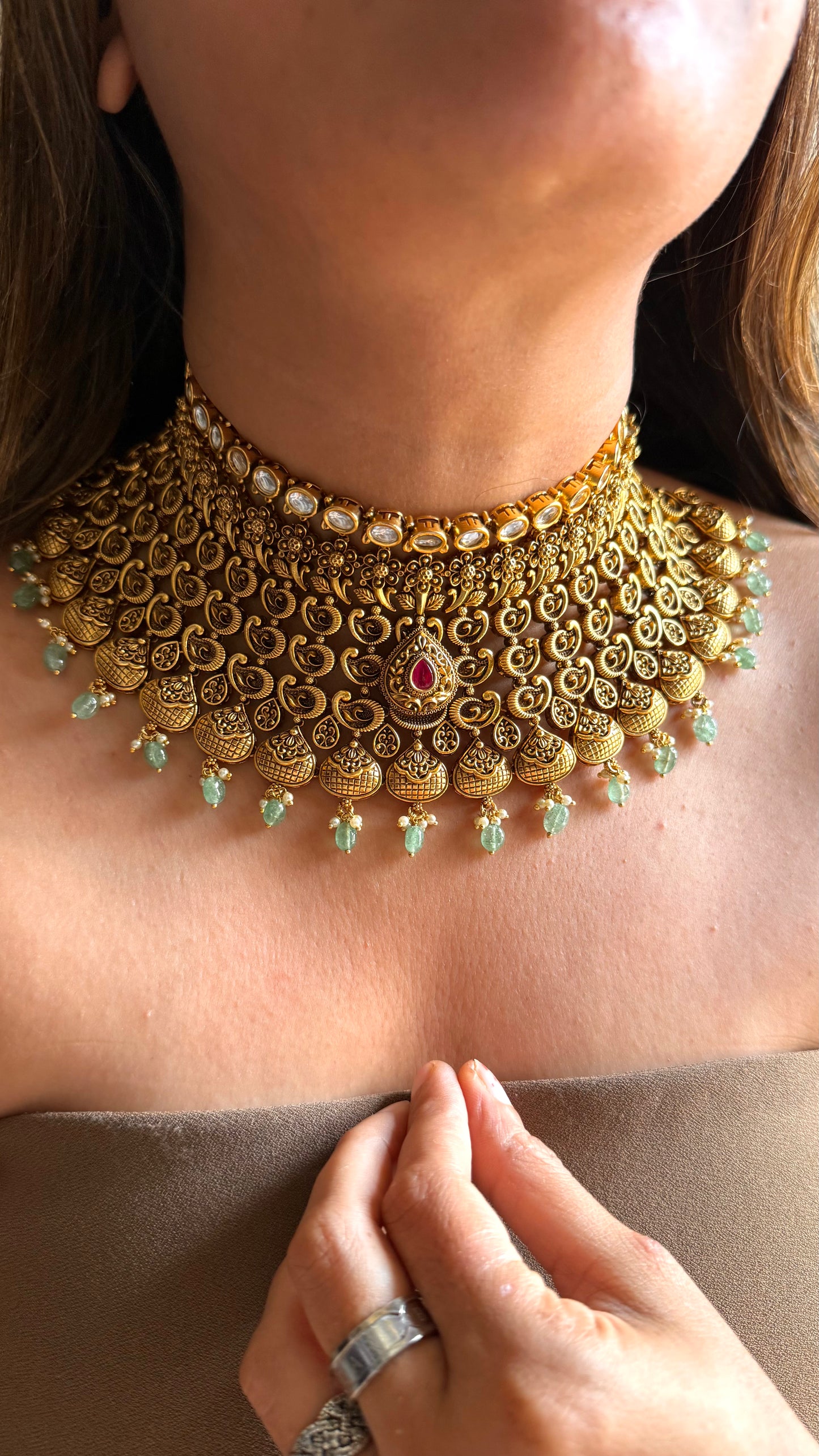 Ambi nakshi oxidised gold choker with ruby and mint detailing