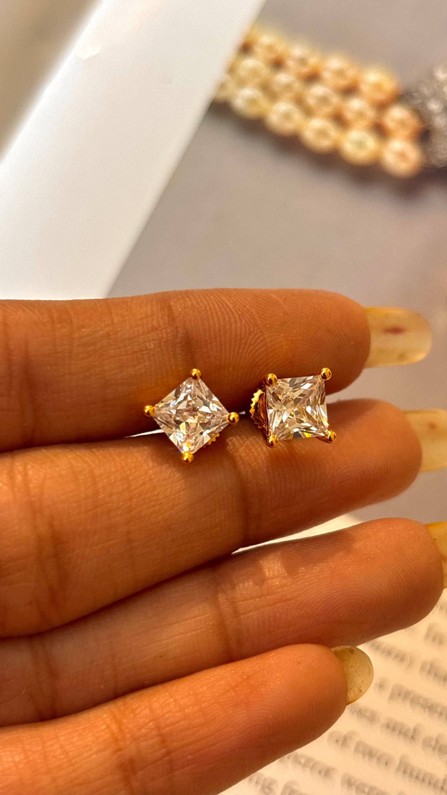 Emerald cut 1 carat gold studs