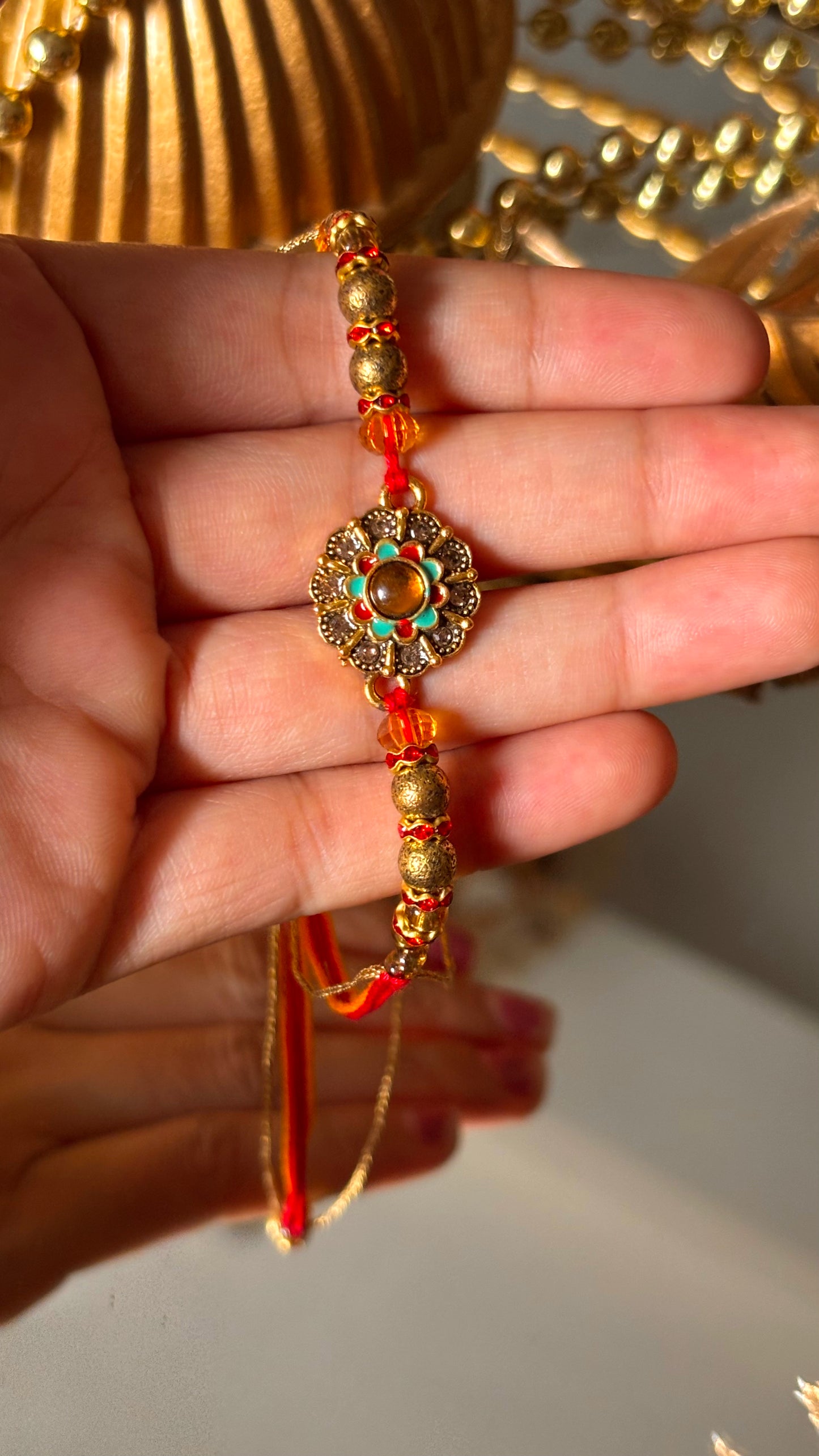 Floral hand painted nakashi oxidised gold Rakhi ( shipping will be extra )