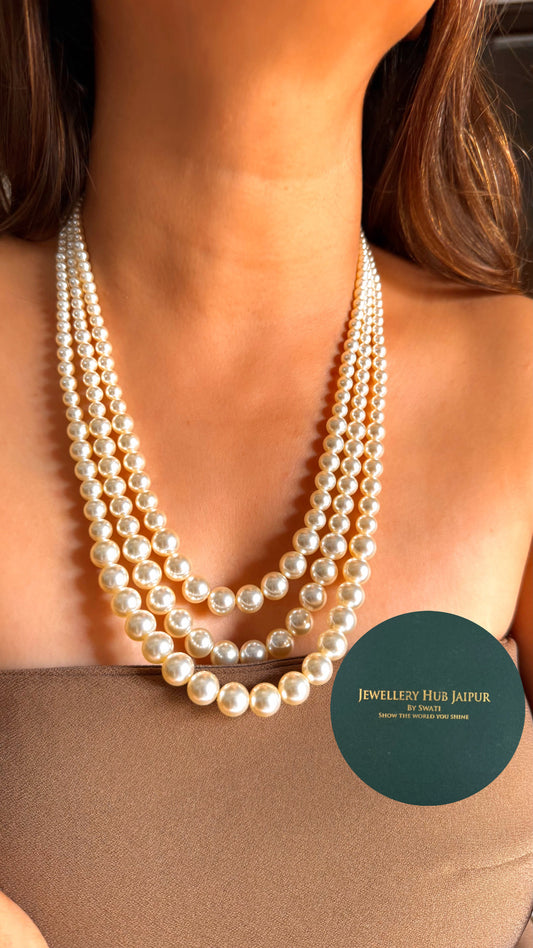 Triple layer pearl mid length necklace