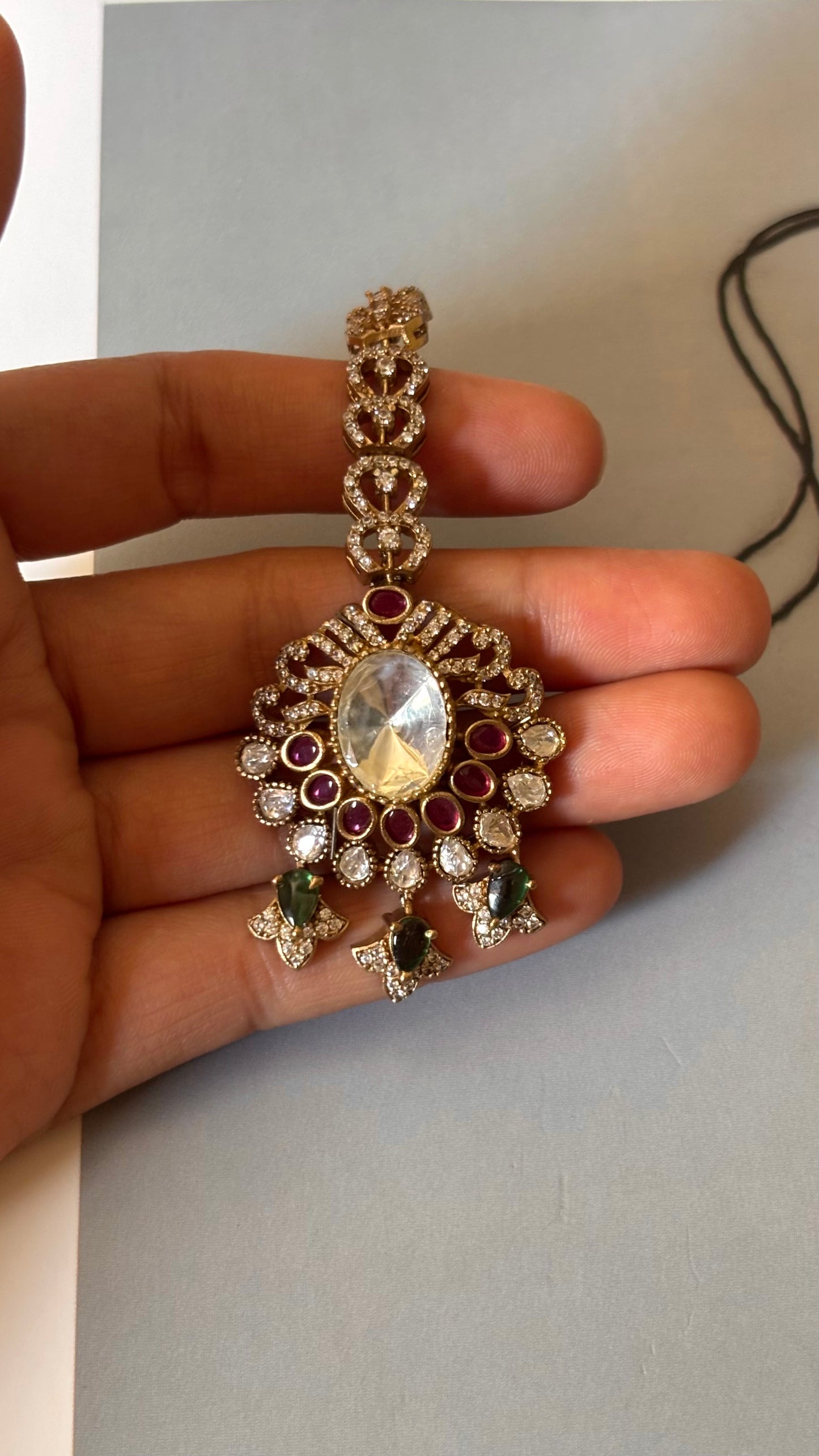 Rani pink with emerald doublet maangtika