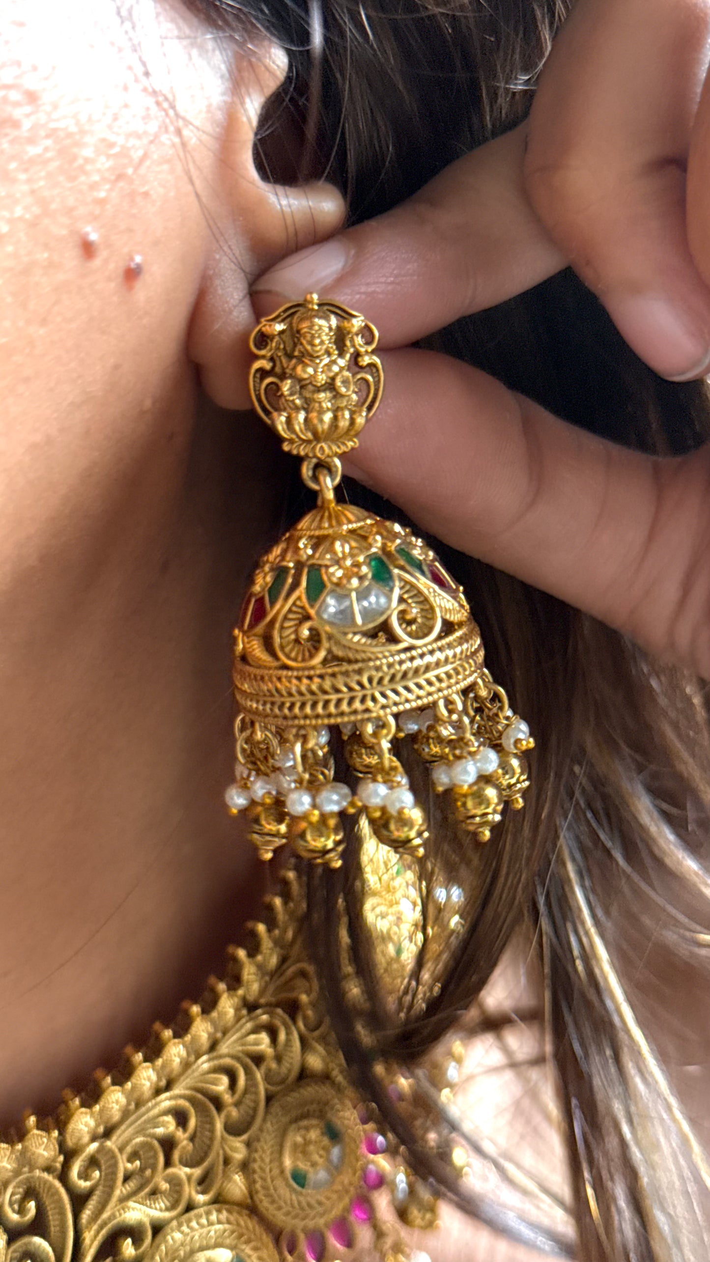 Goddess Laxmi inspired temple jewellery with peacock motif