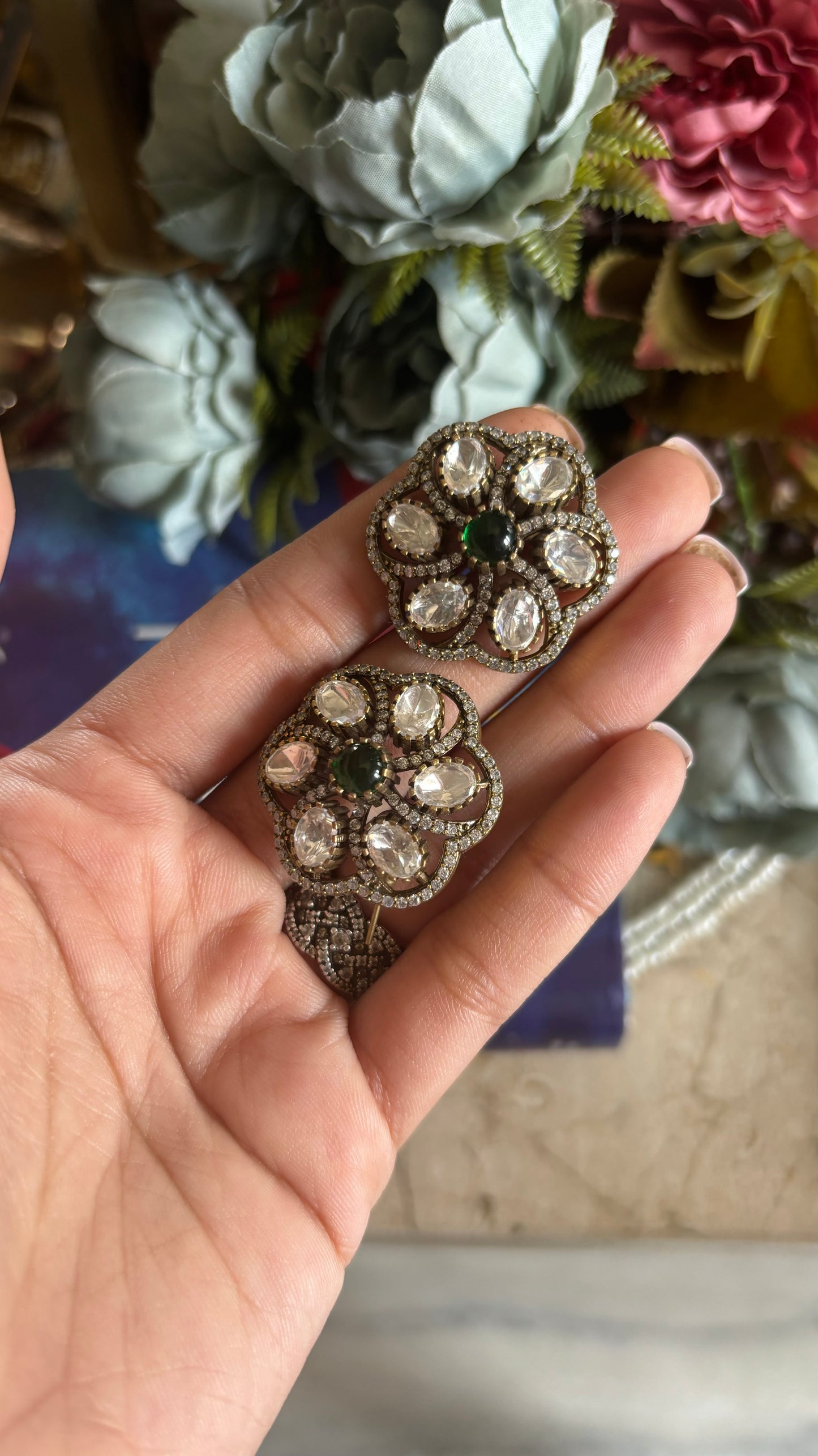 Moissanite emerald floral studs