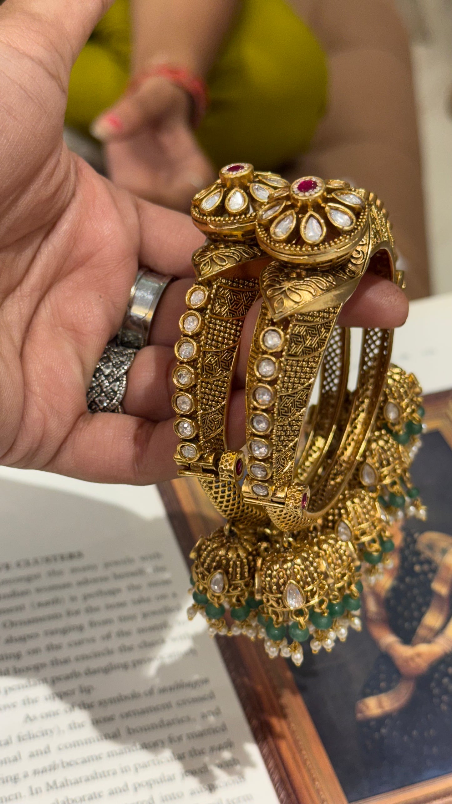 Rajwasa floral pattern bangles with rani pink stone and jhumki details