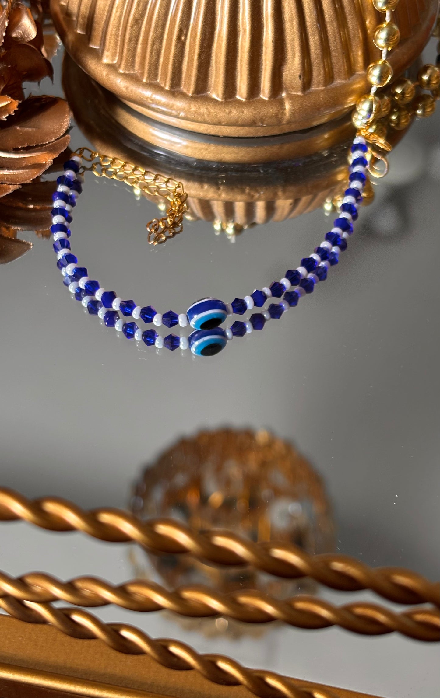 Evil eye sapphire rakhi ( shipping will be extra )