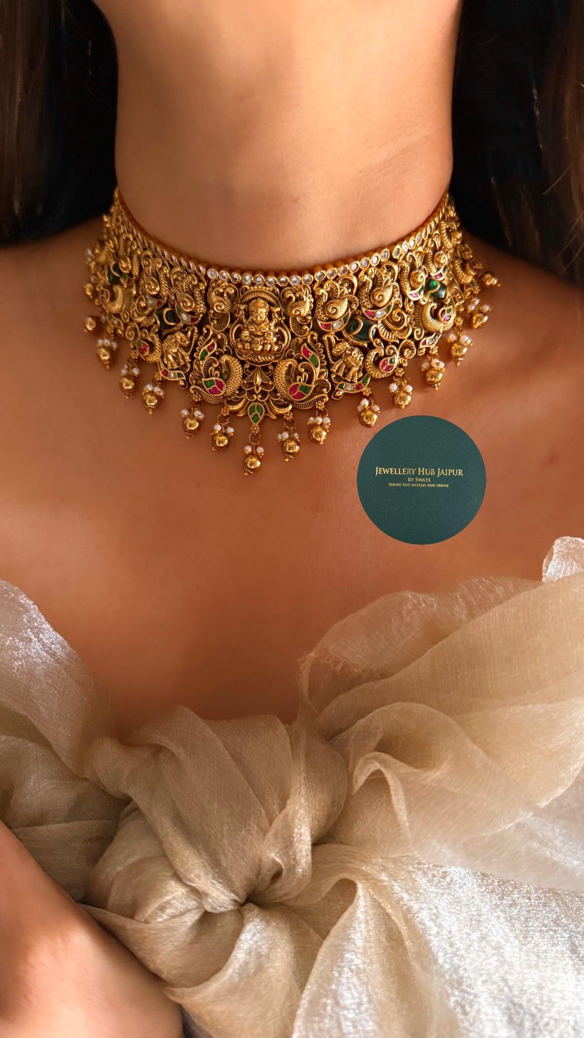 Goddess laxmi with emerald & rani pink choker set