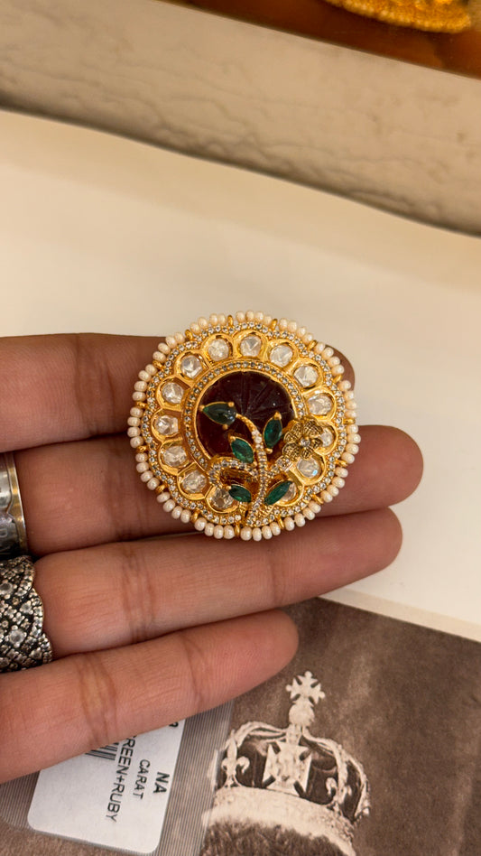 Ruby cocktail ring with leaf detailing