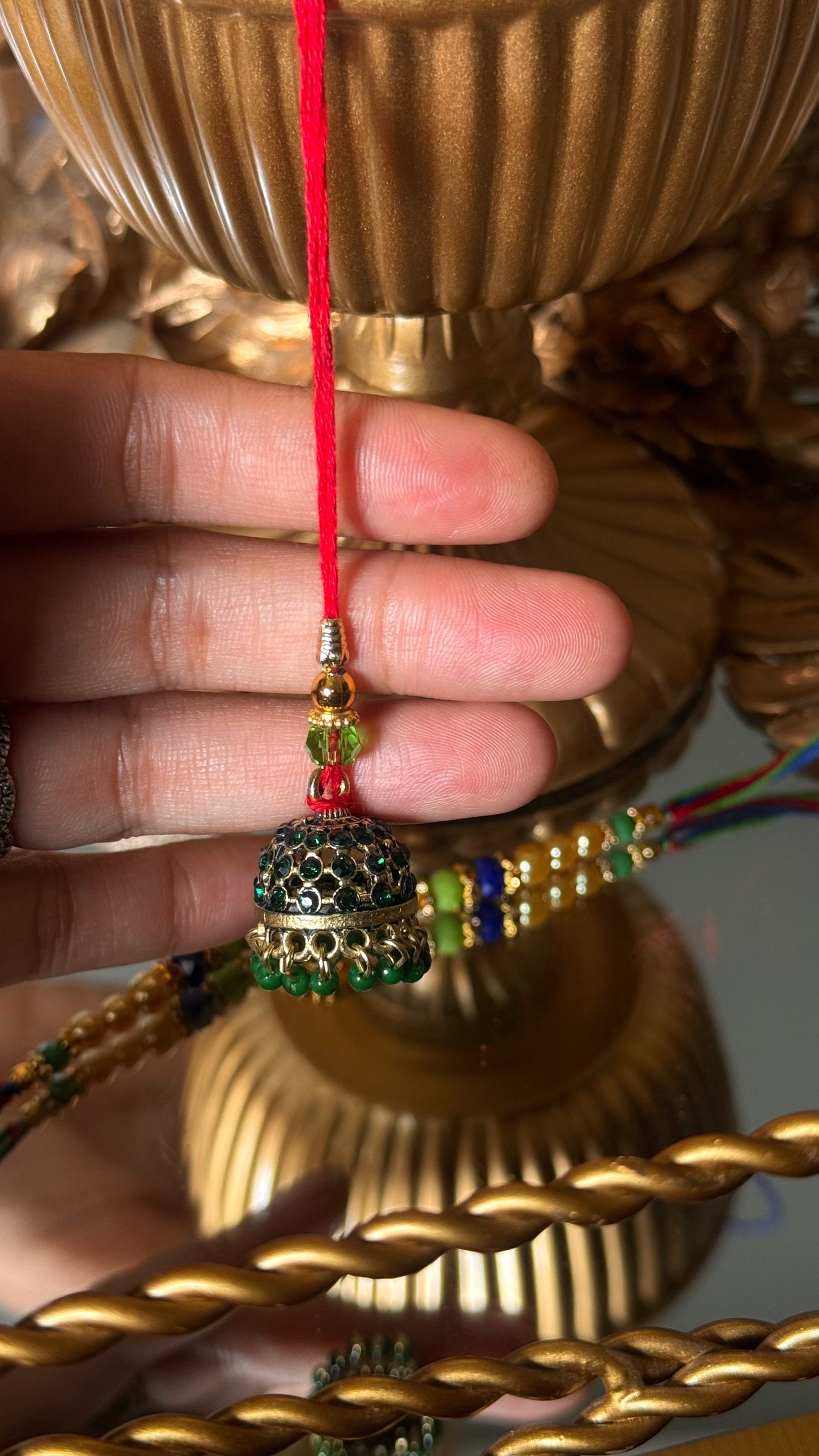 Jhumki rakhi for her