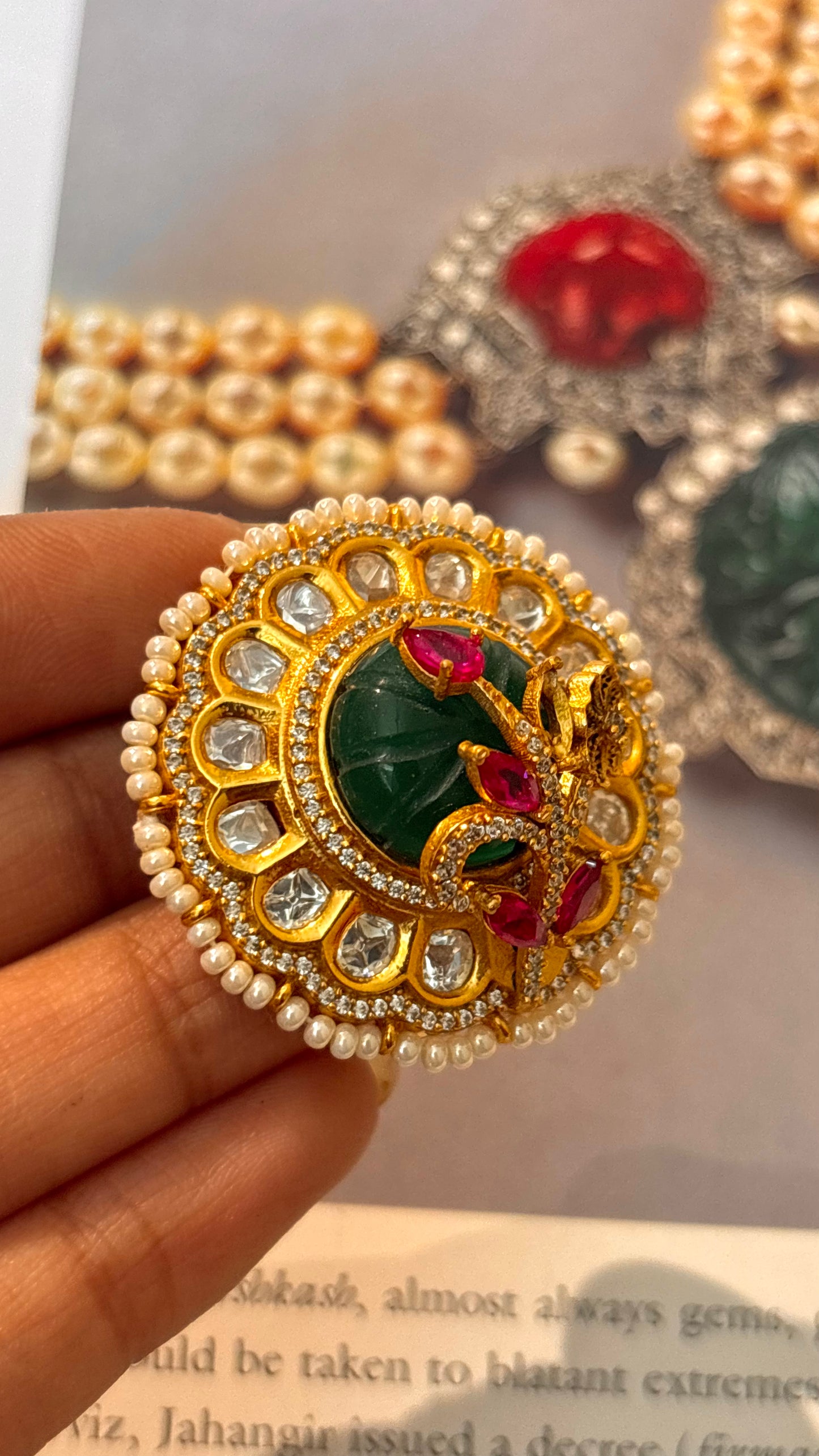 Emerald inslay moissanite gold ring with ruby leaf detailing