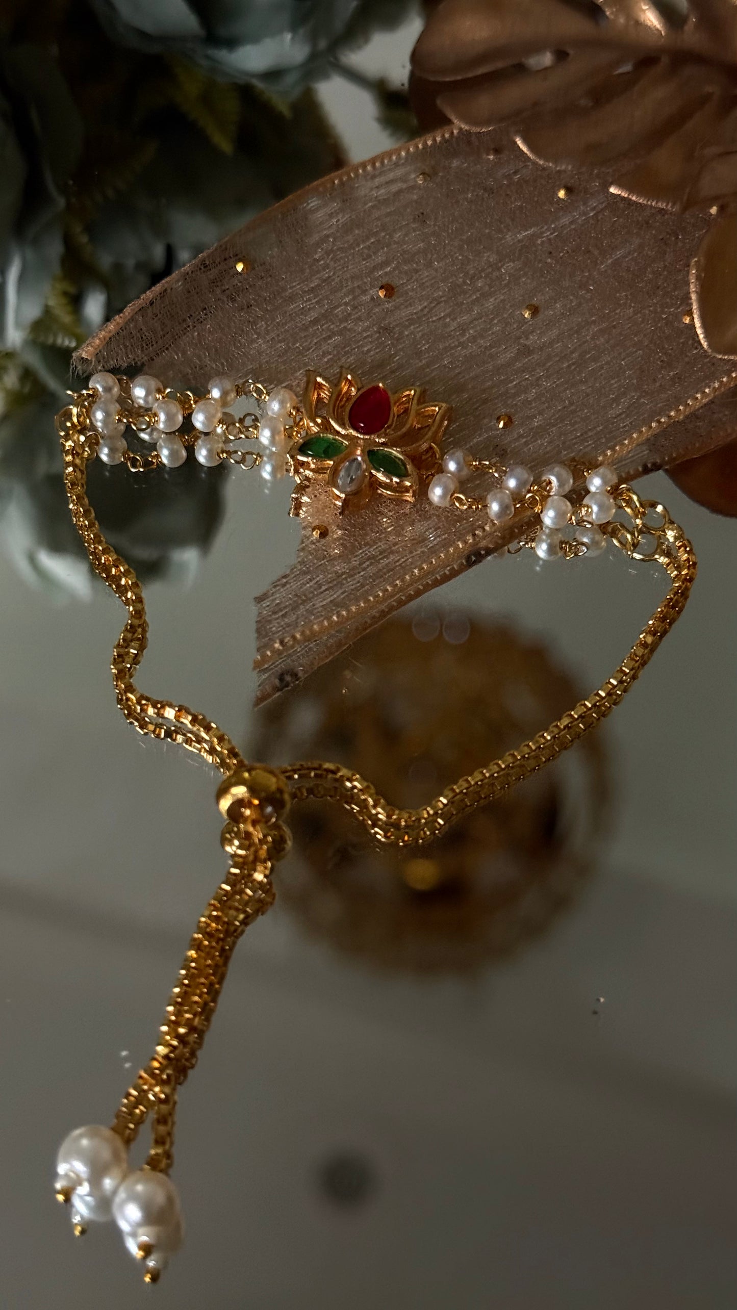 Ruby & emerald lotus inspired Rakhi (shipping will be extra )