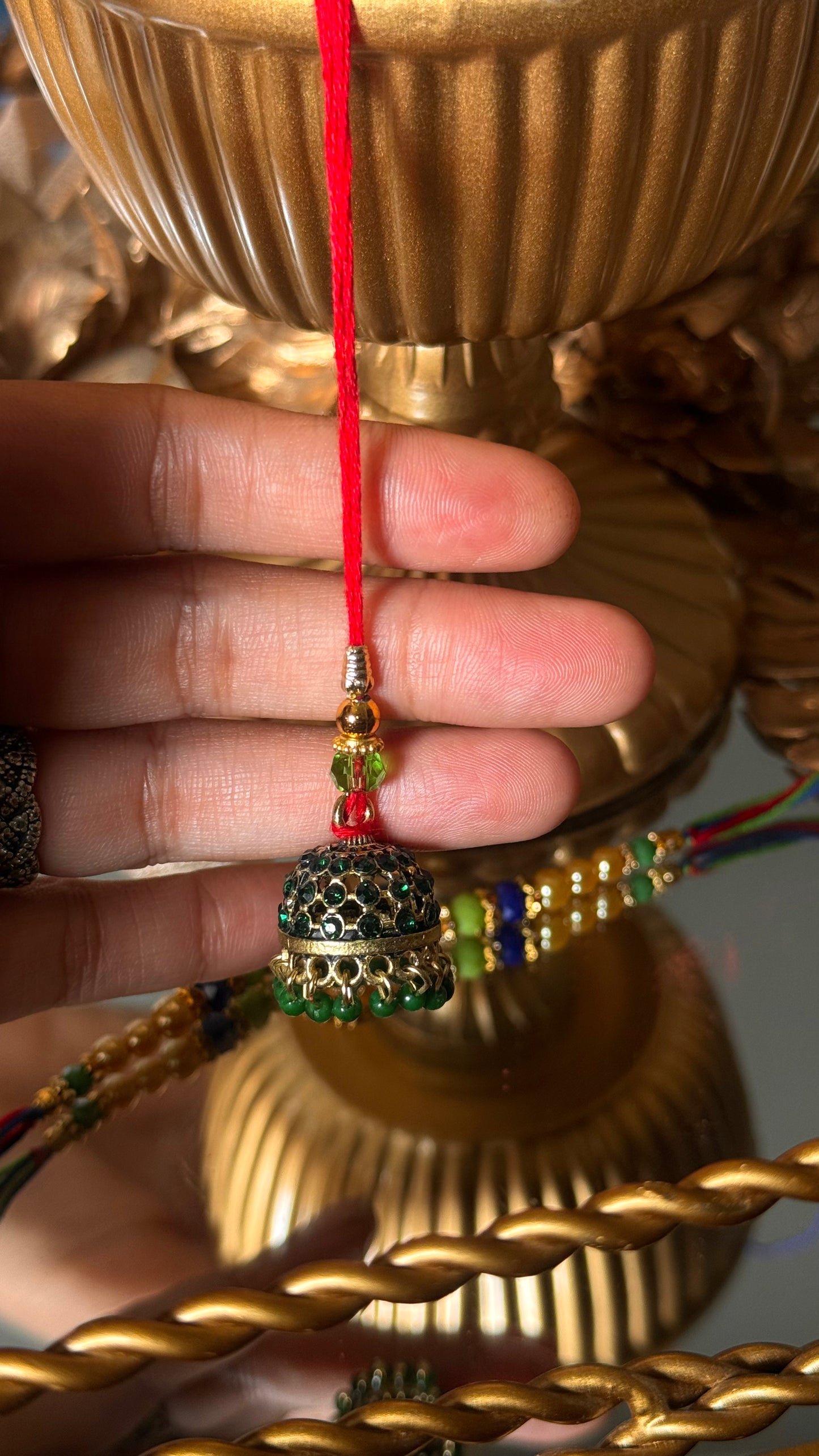 Jhumki rakhi for her