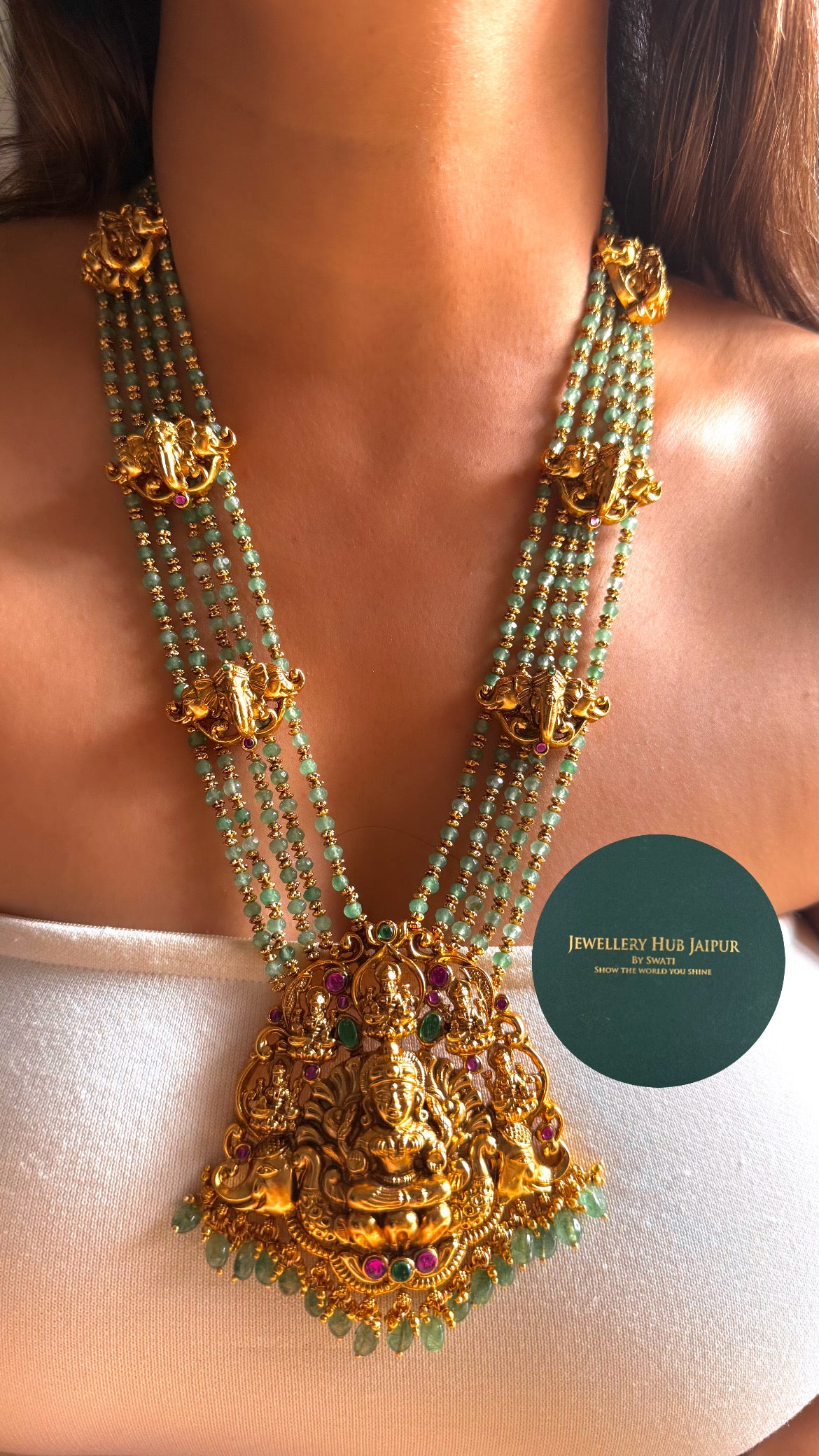 Goddess laxmi emerald & rani pink with mint string & gajj long set
