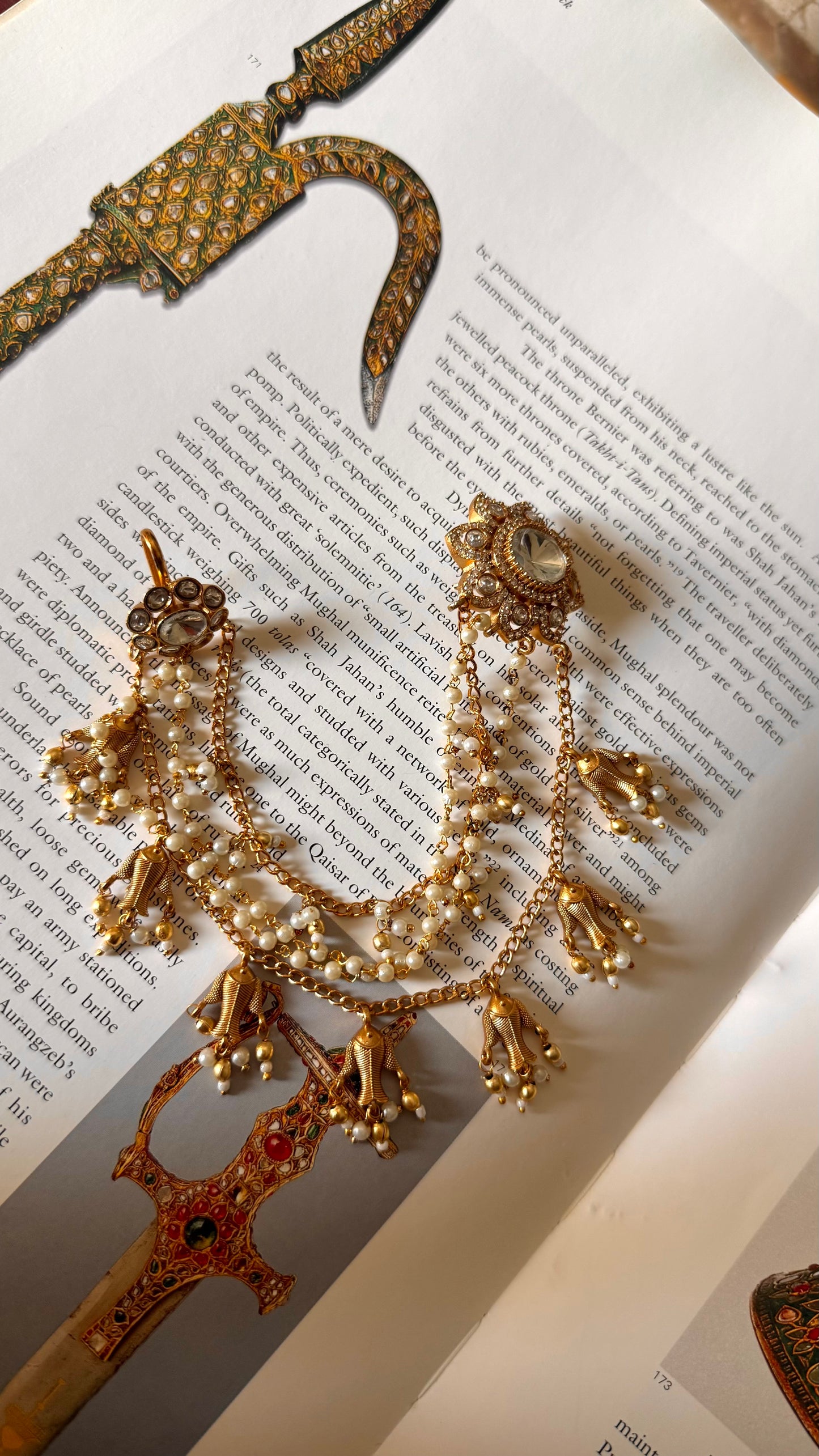 Floral studs attached with fish drops Kaanchain
