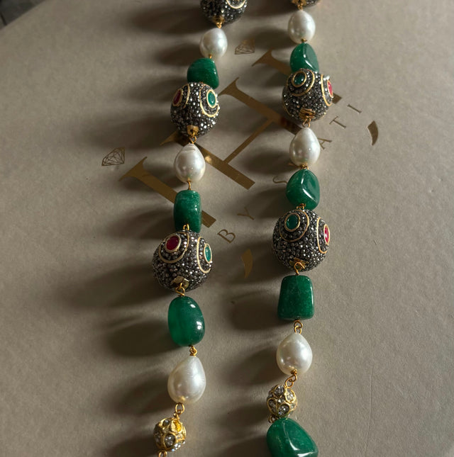 Emerald pearl and ruby string