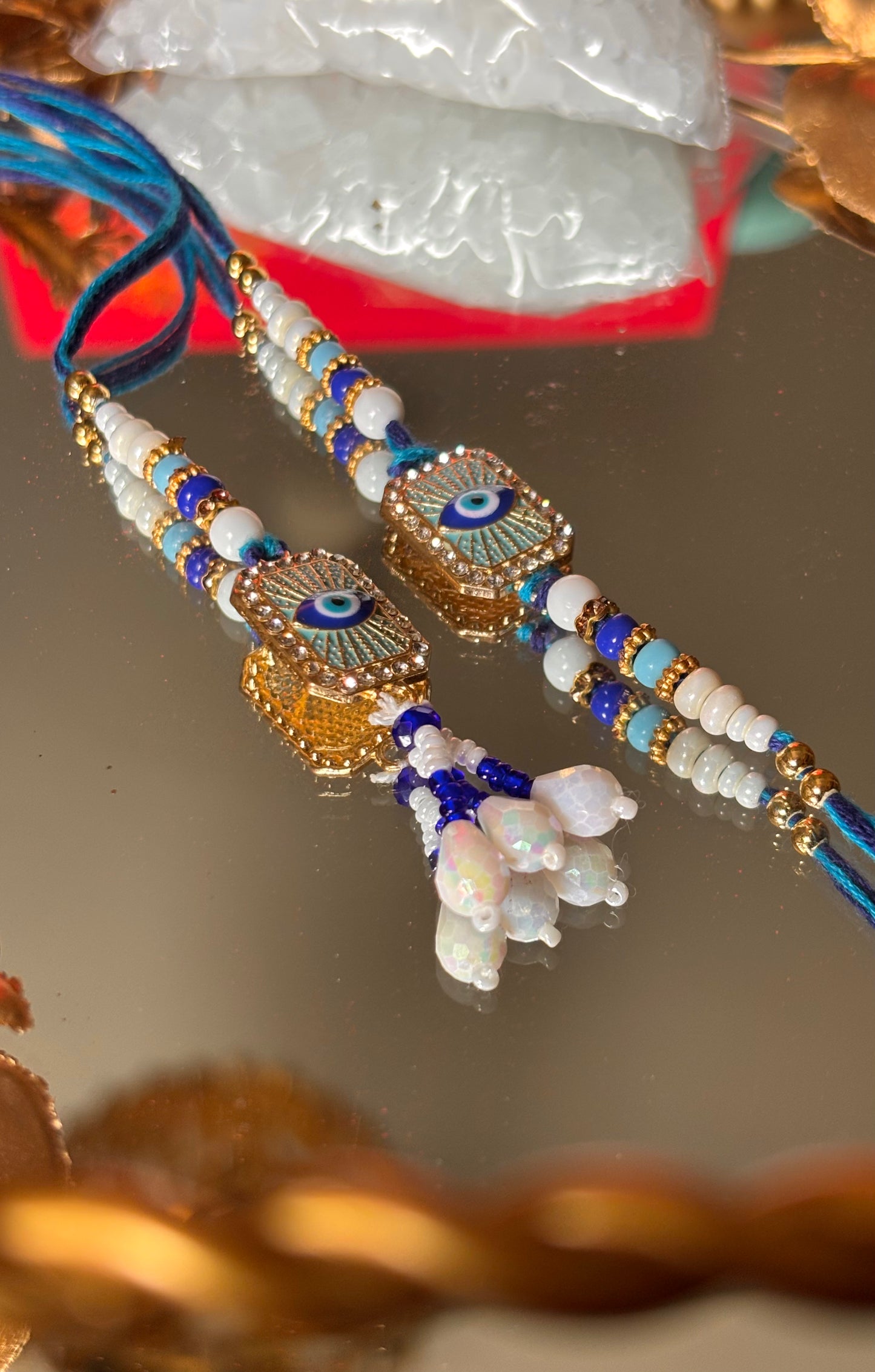Evil eye couple rakhi ( shipping will be extra )