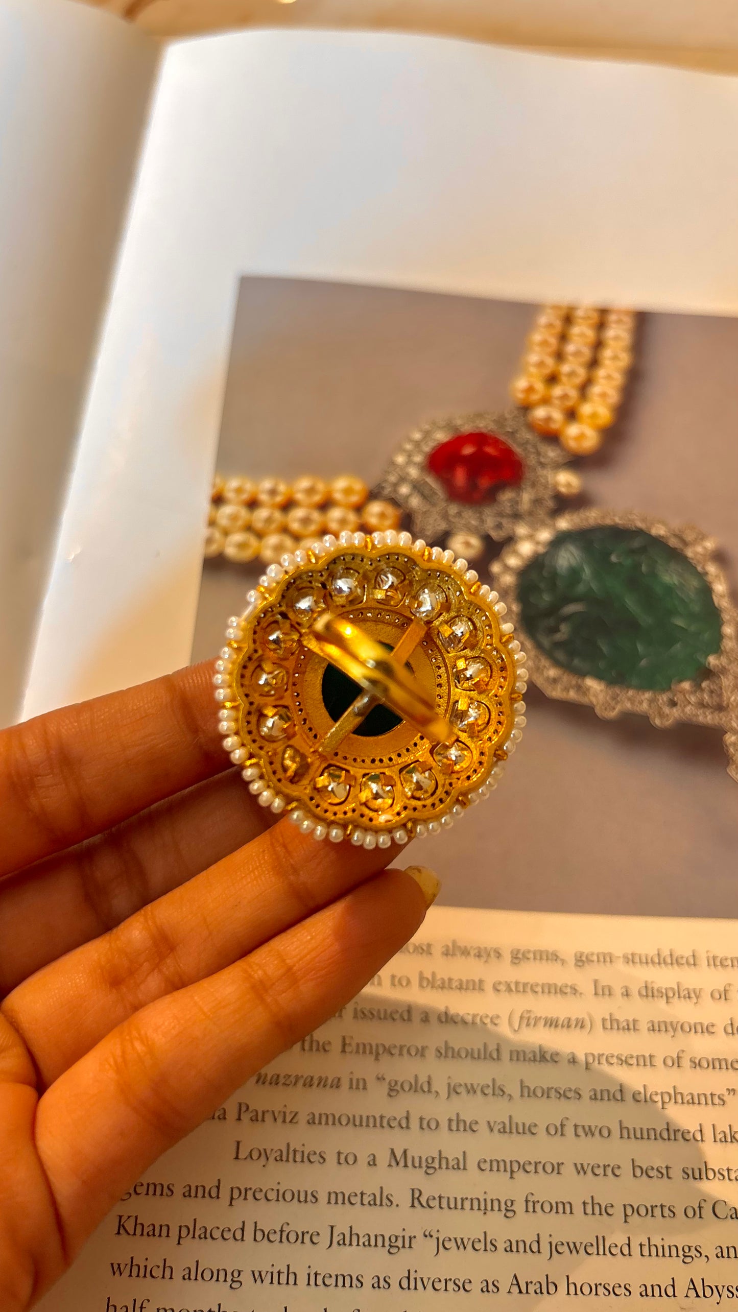 Emerald inslay moissanite gold ring with ruby leaf detailing