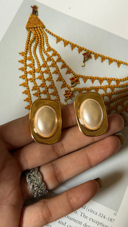 Off white & golden studs