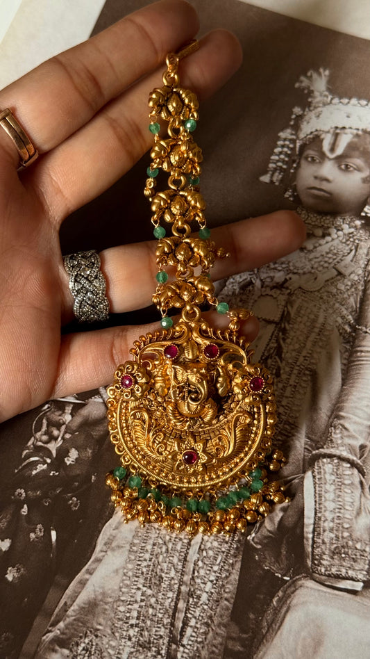 Lord ganesh rani pink & emerald maangtika