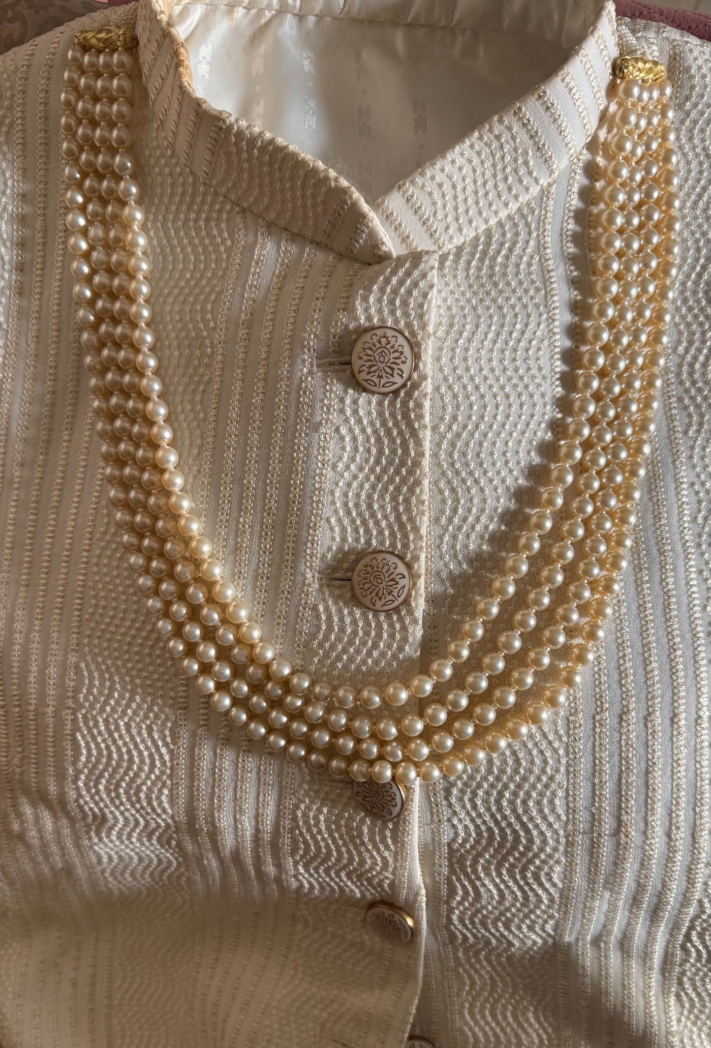 Four line off white Pearl string
