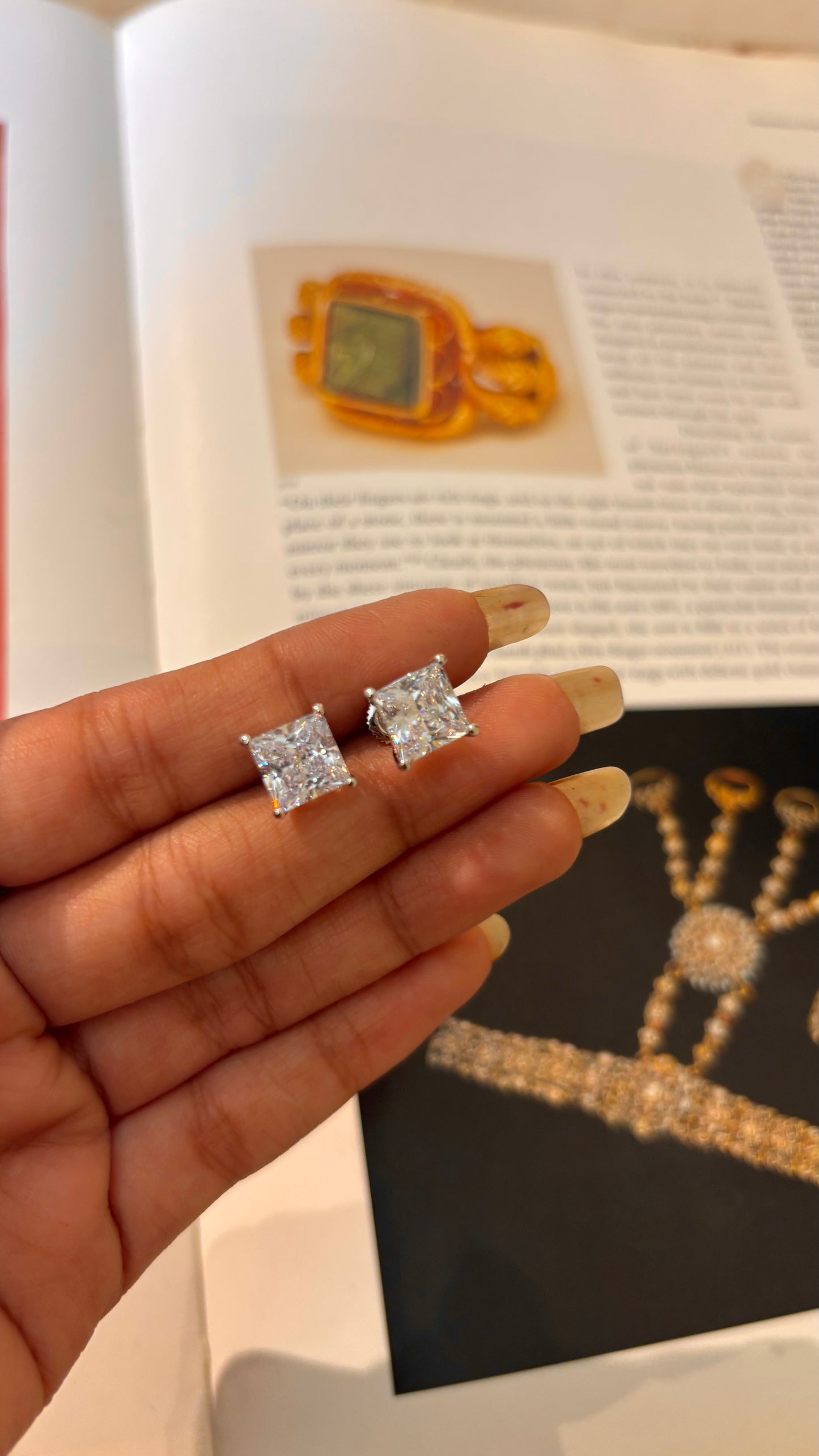 Emerald cut rhodium 1 carat diamond studs