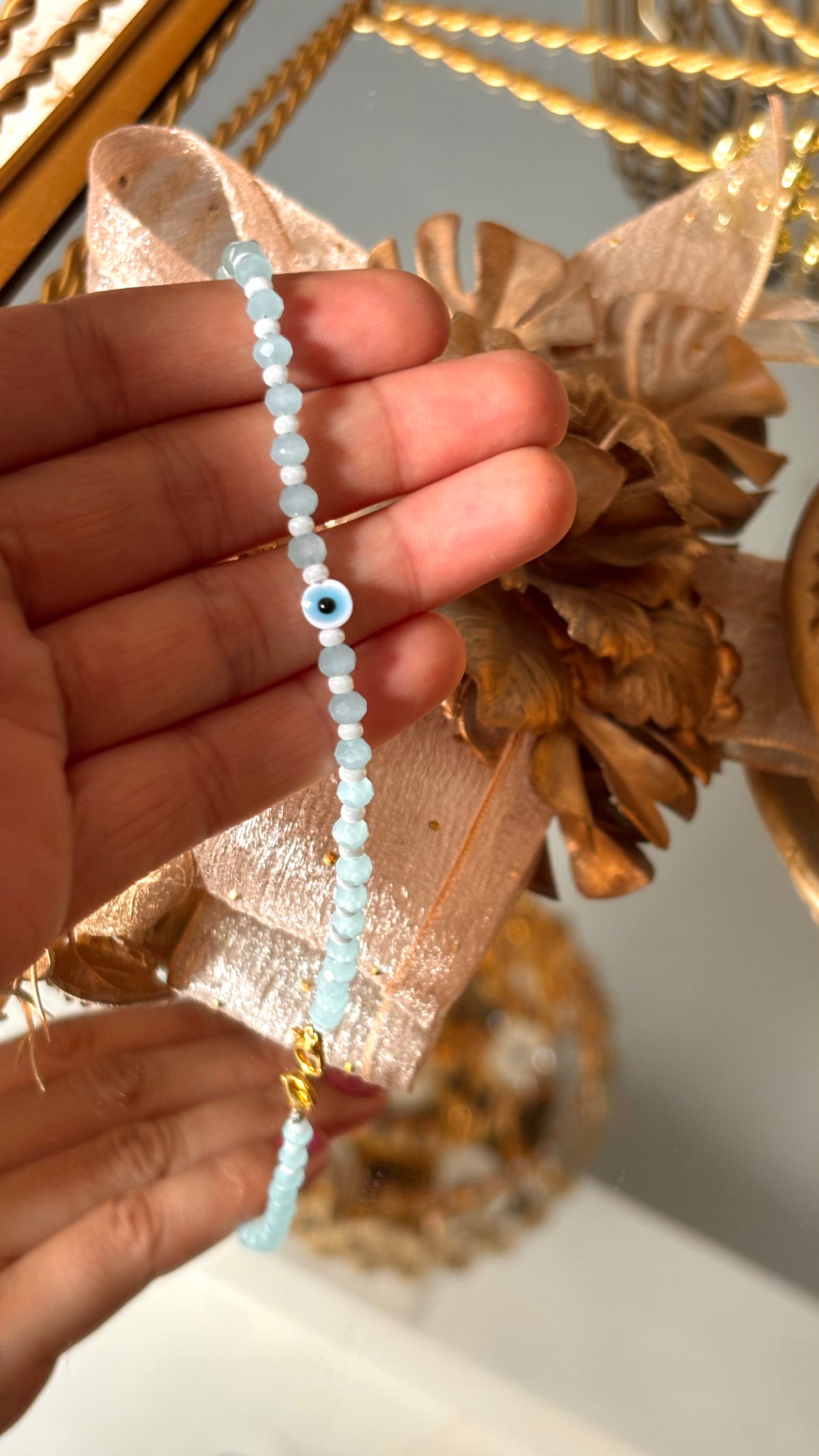Evil eye rakhi (powder blue) (shipping will be extra )